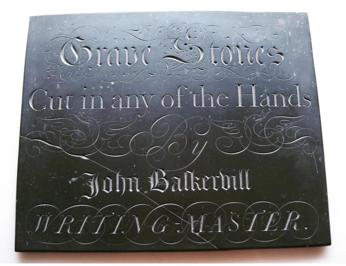 The reproduction Baskerville slate that hangs in the chapel.