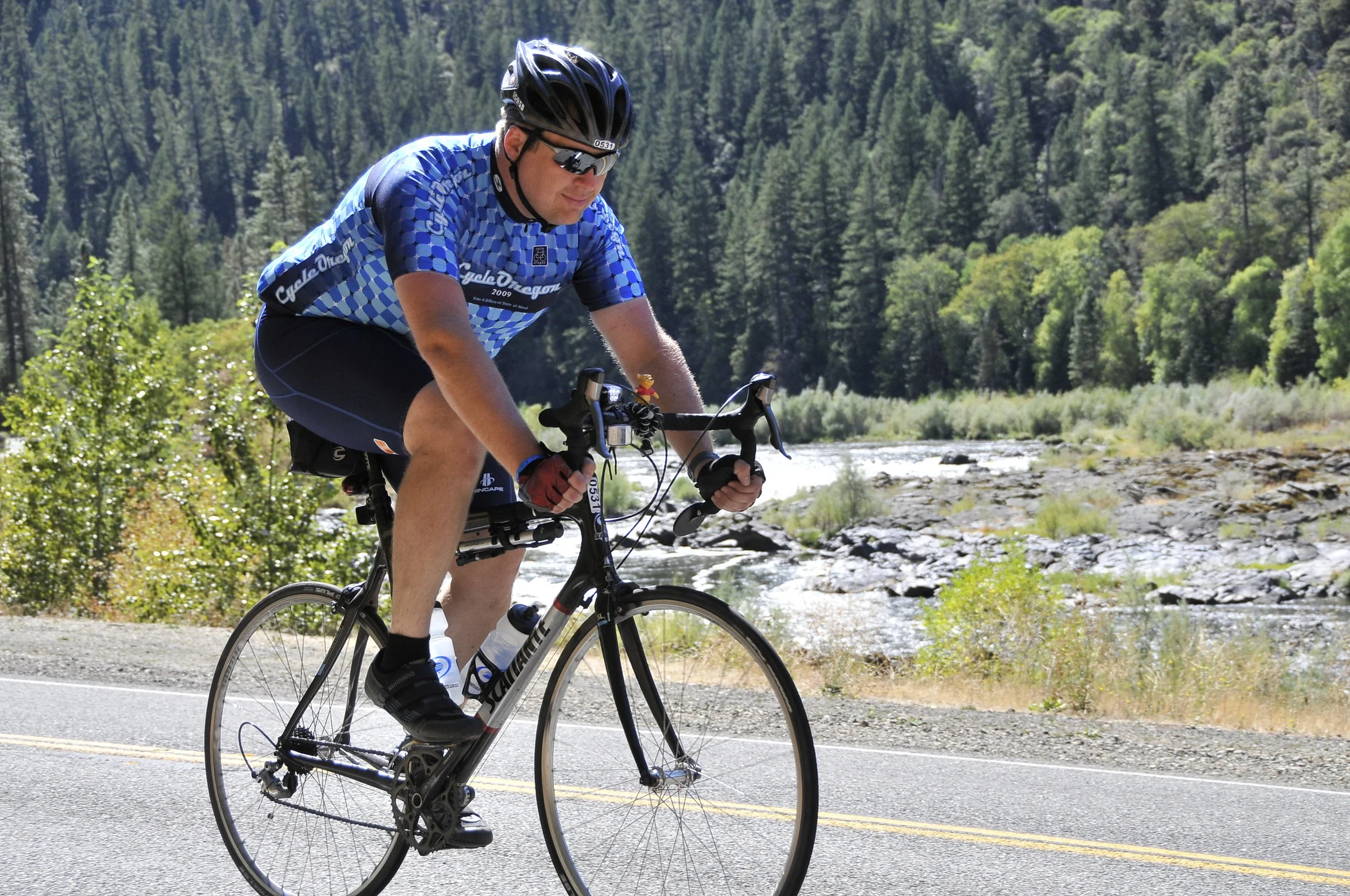 Cycle Oregon 2009. Cruising down highway 96 along the Klamath River on my way to Happy Camp, CA, in the gorgeous state of Jefferson.