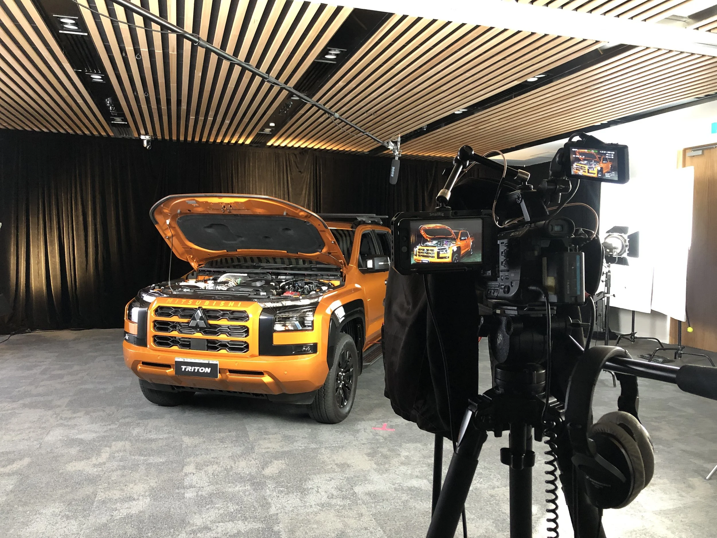 Mitsubishi Triton being filmed with camera and teleprompter