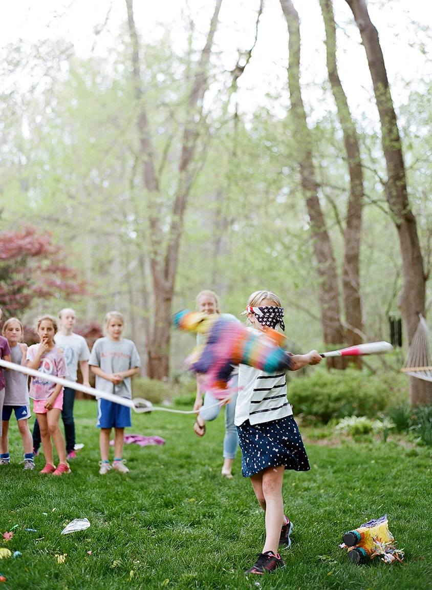 Ellie Smashing Pinata.jpg