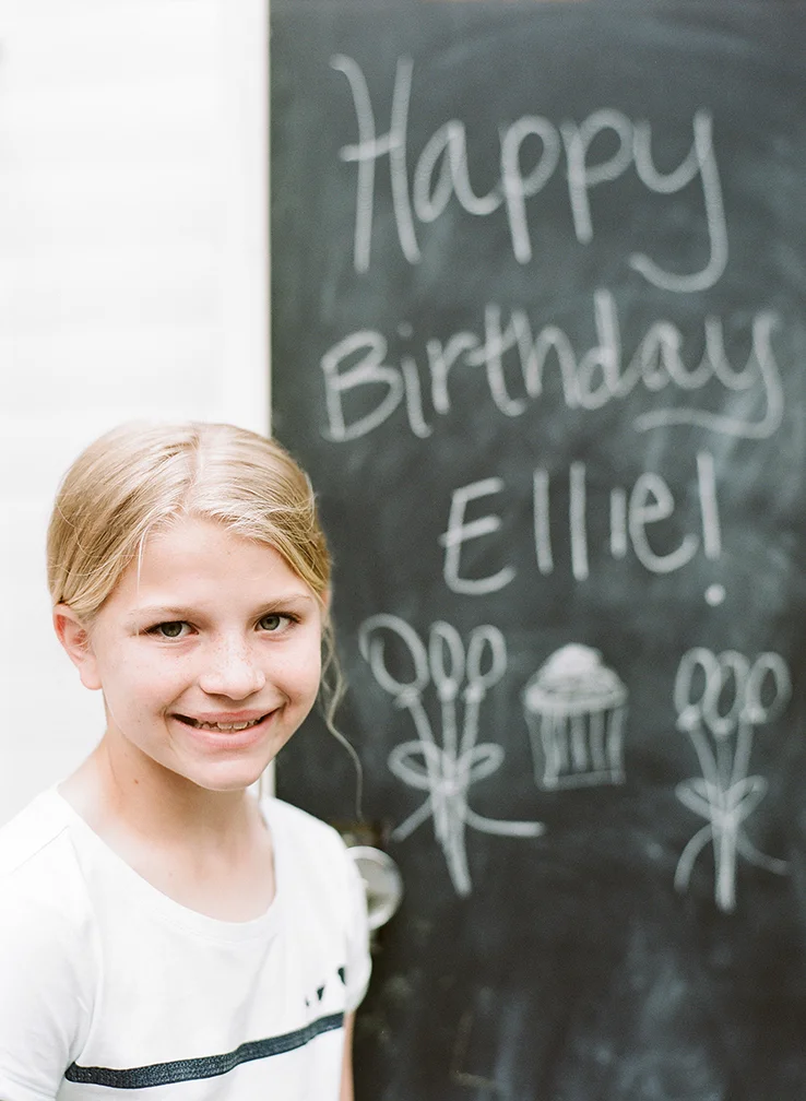 Ellie Portrait Next to B-Day Sign.jpg