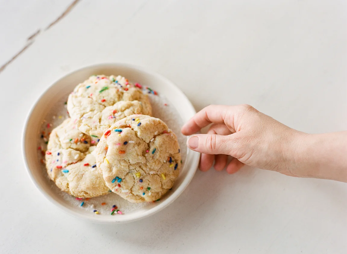 Hand Going For the Sugar Funfetti Cookie_web.jpg