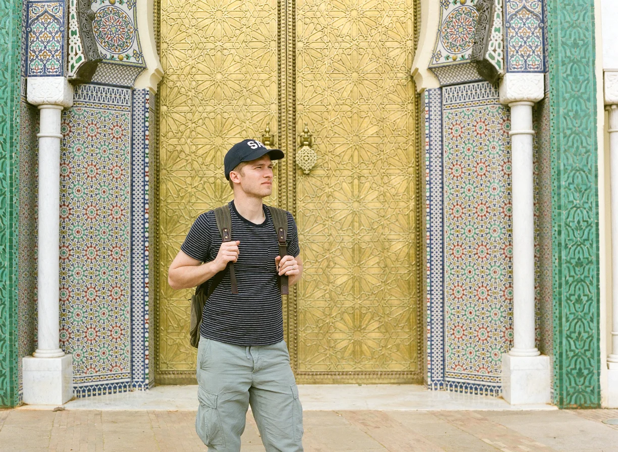 Cole in front of palace gates_fez_web.jpg
