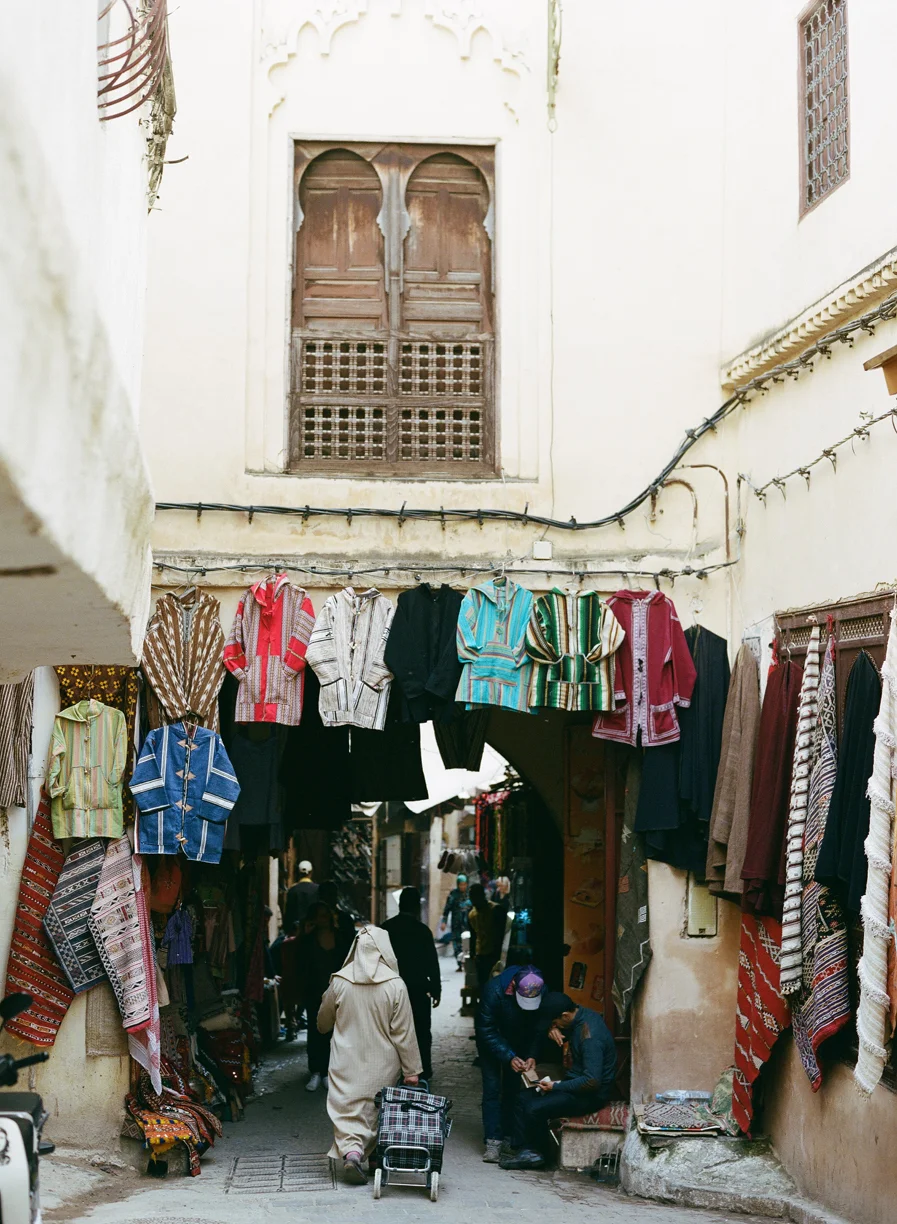 Man walking with cart in fez medina_web.jpg