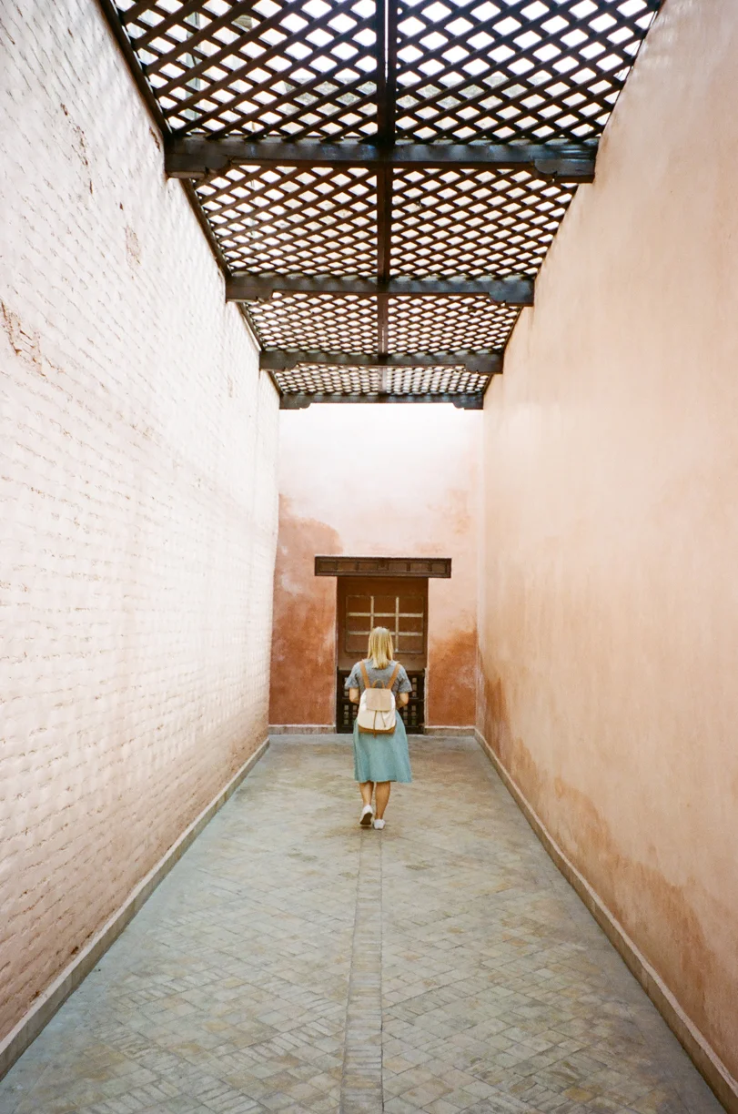Allison Walking in Pink Hallway to Saadian Tombs_Marrakech_web.jpg