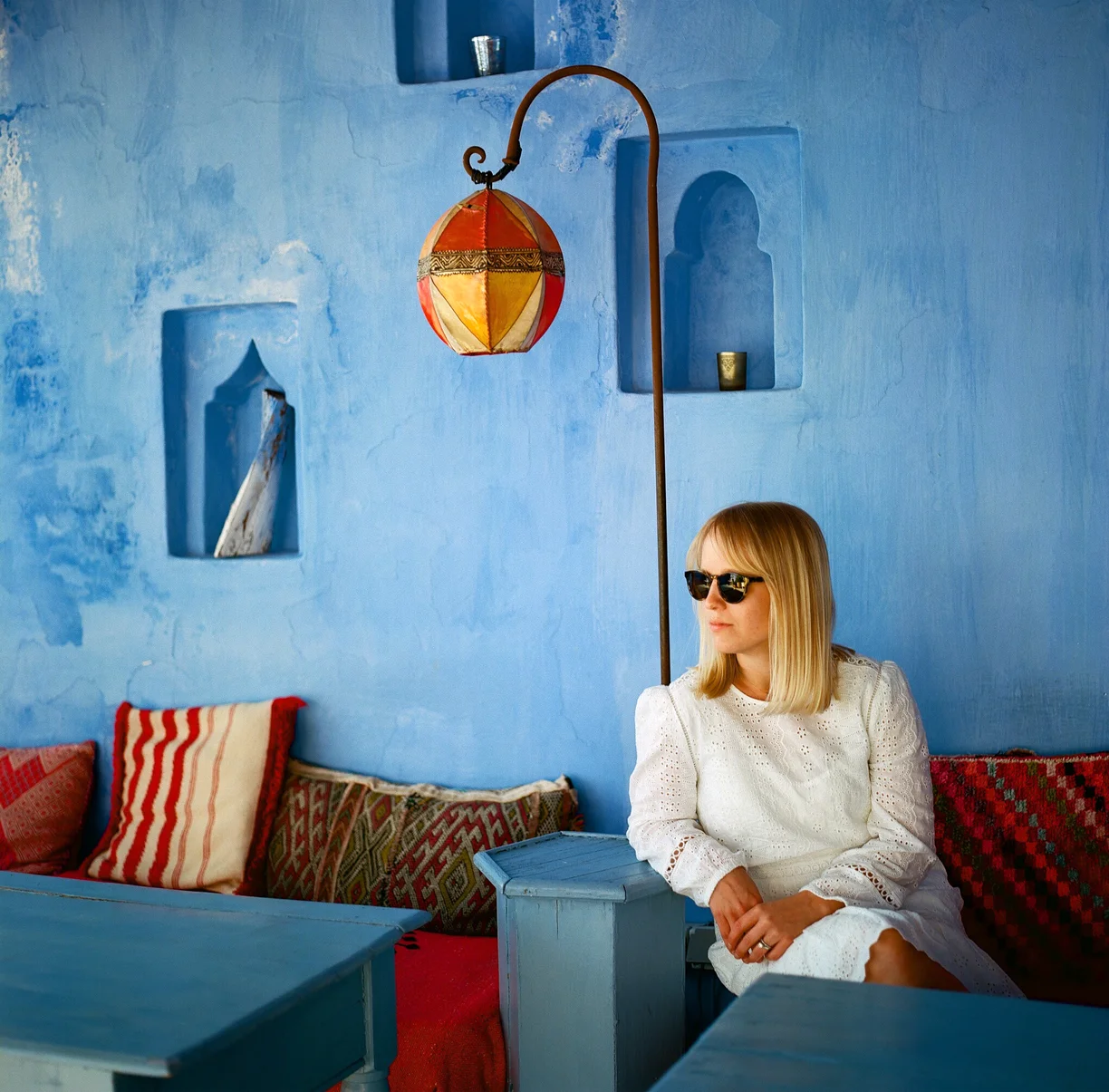 Allison with Shades on deck of riad in Chefchaouen_web.jpg