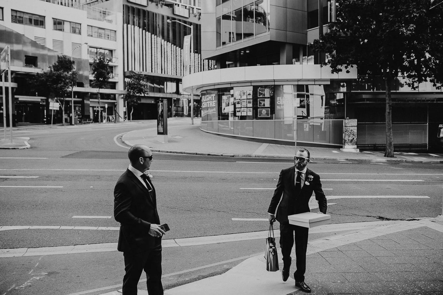 Bestman and groom waiting for the wedding car