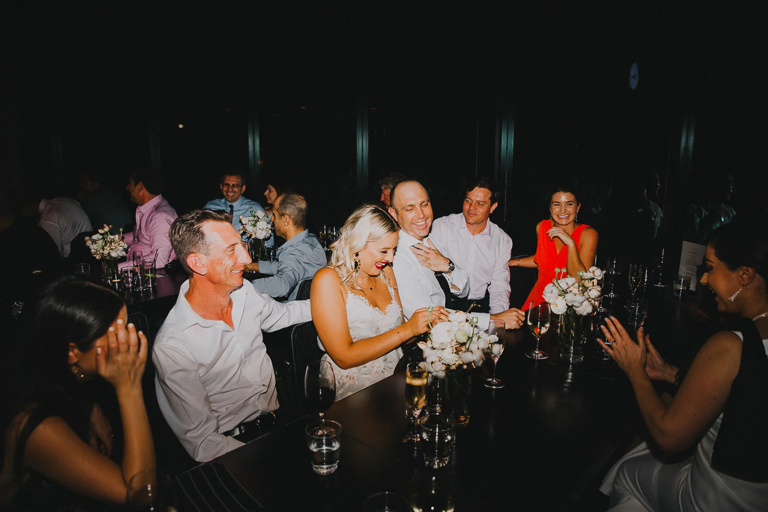 Groom having fun at the reception