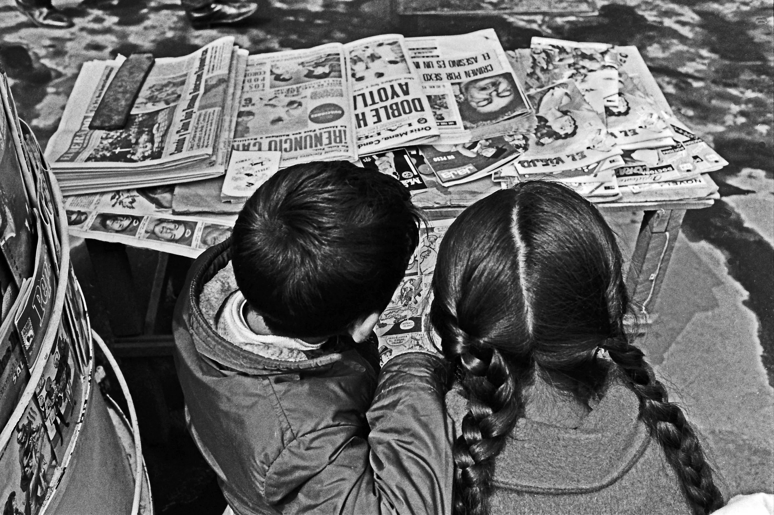 Two Kids Newspapers Corr.jpg