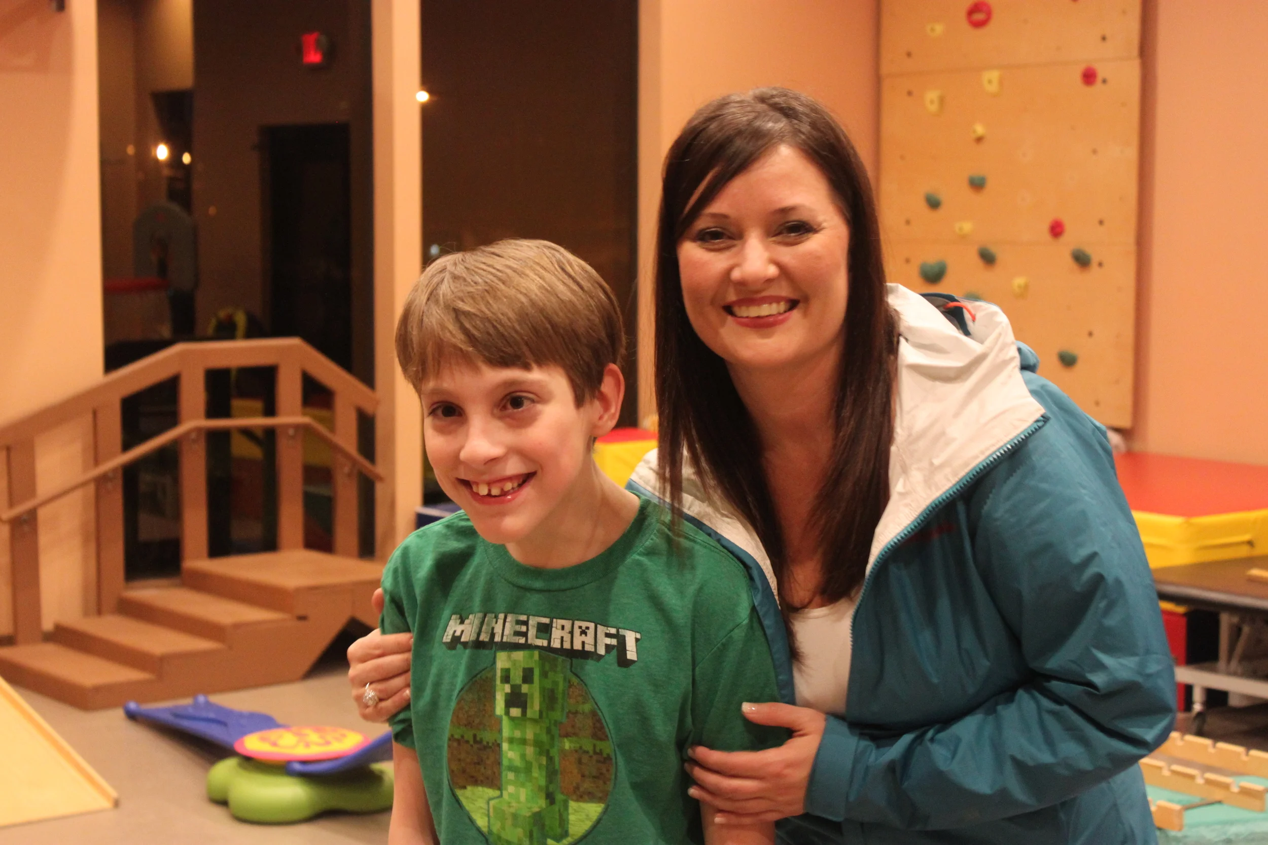 Kim Smith, MMC's Director of Marketing, pictured with Special Kids child, Ivan