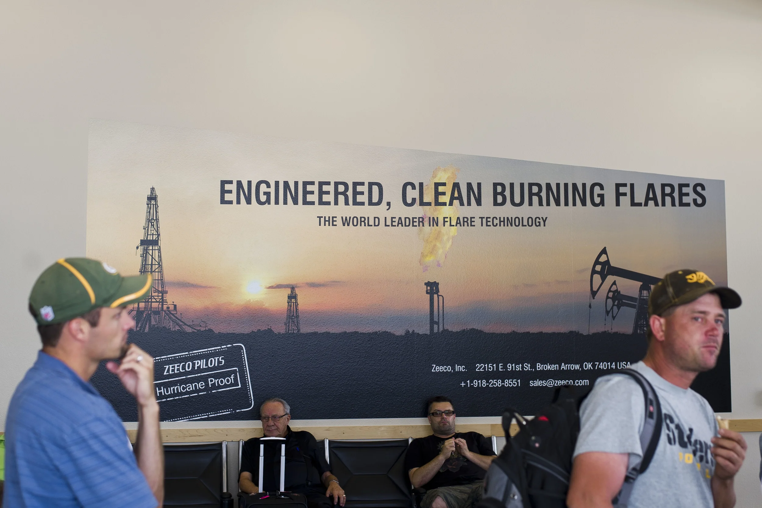 Advertising for "clean burning flares" in the Bismarck International Airport, 2013. The state has since passed sweeping regulations to significantly decrease flared gas across the state. 