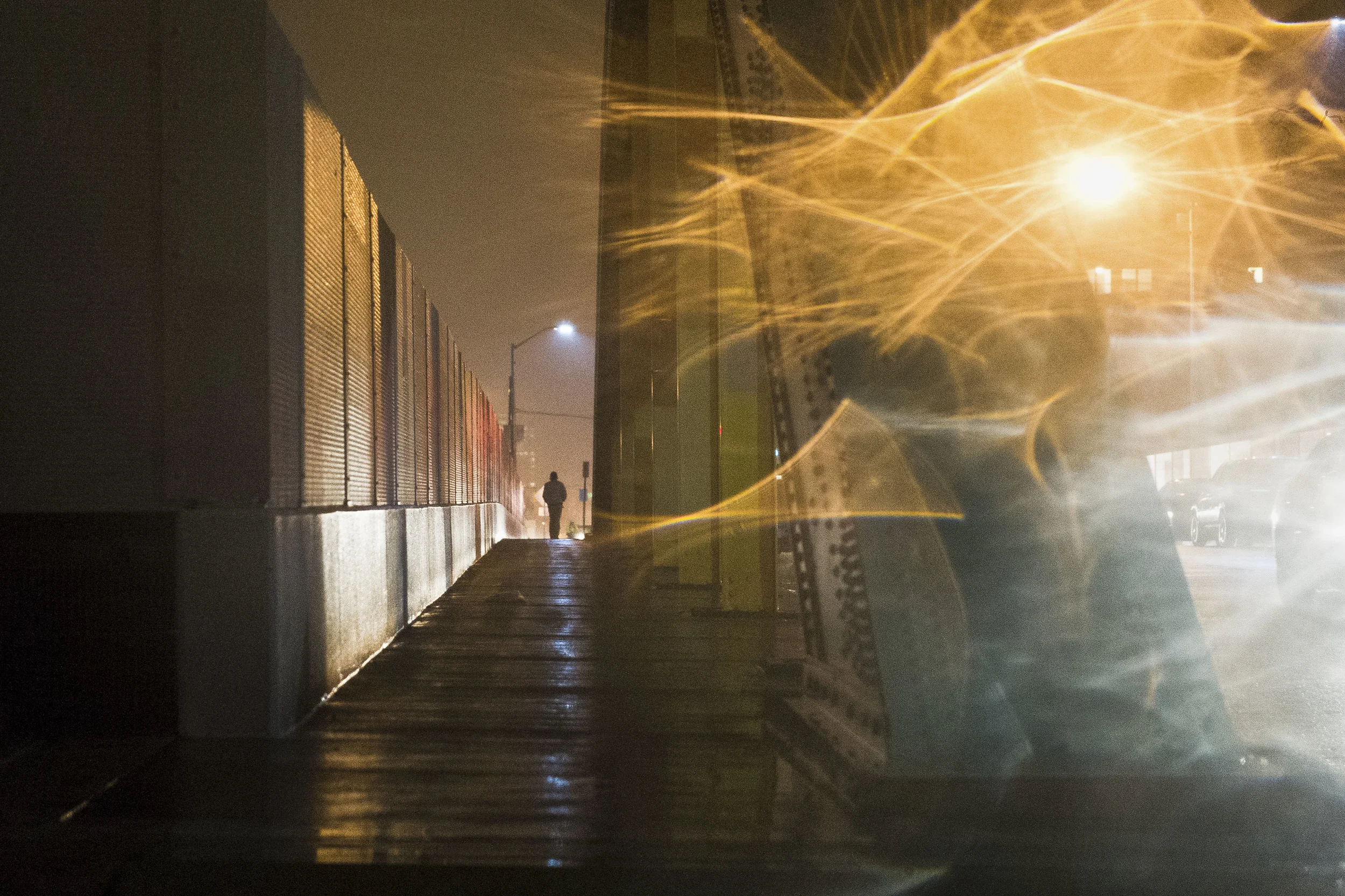 A rainy night on the Guilford Avenue bridge over I-83.