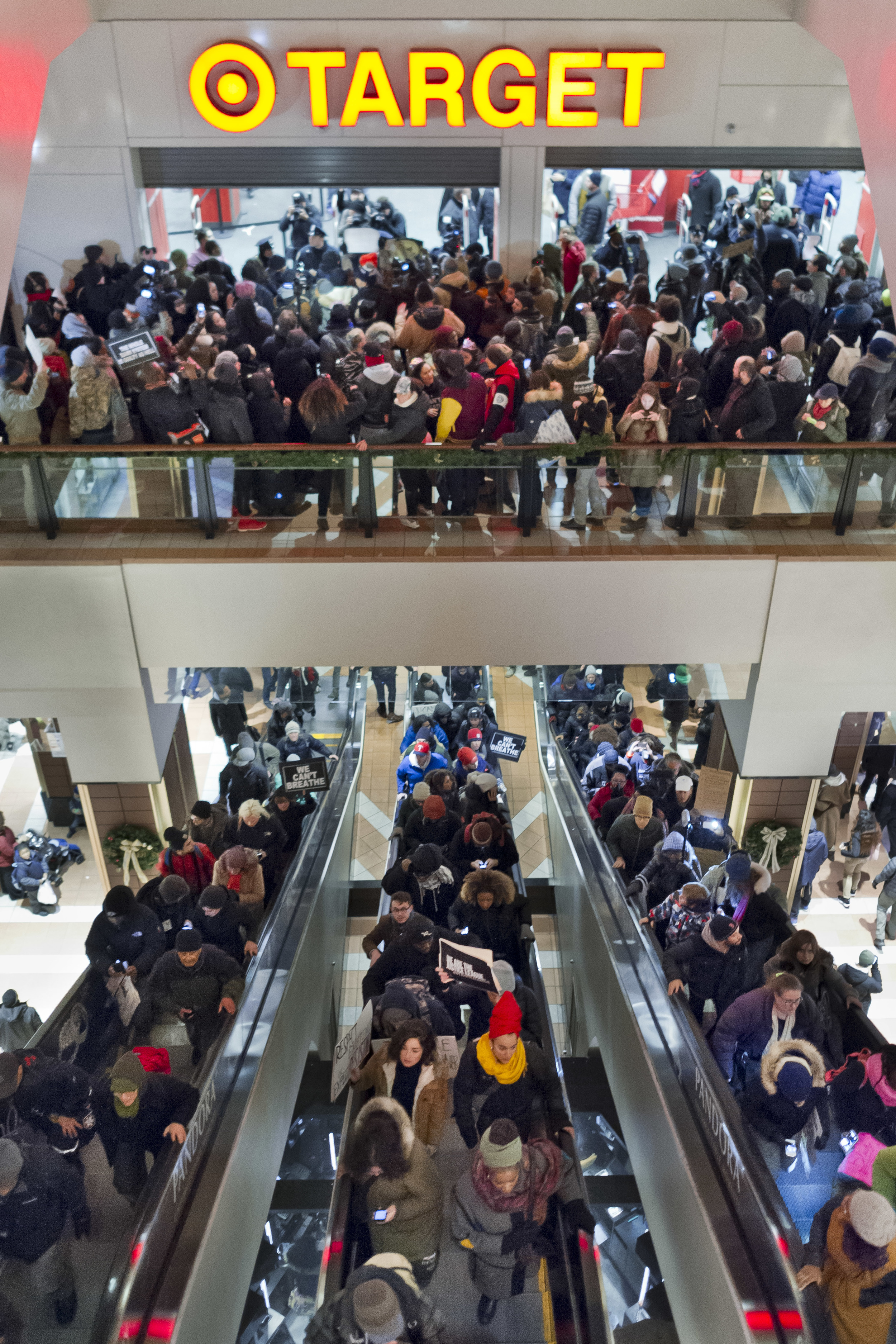  Protestors flood the escalators at the Atlantic Terminal in Brooklyn, forcing Target to close their doors.&nbsp; 