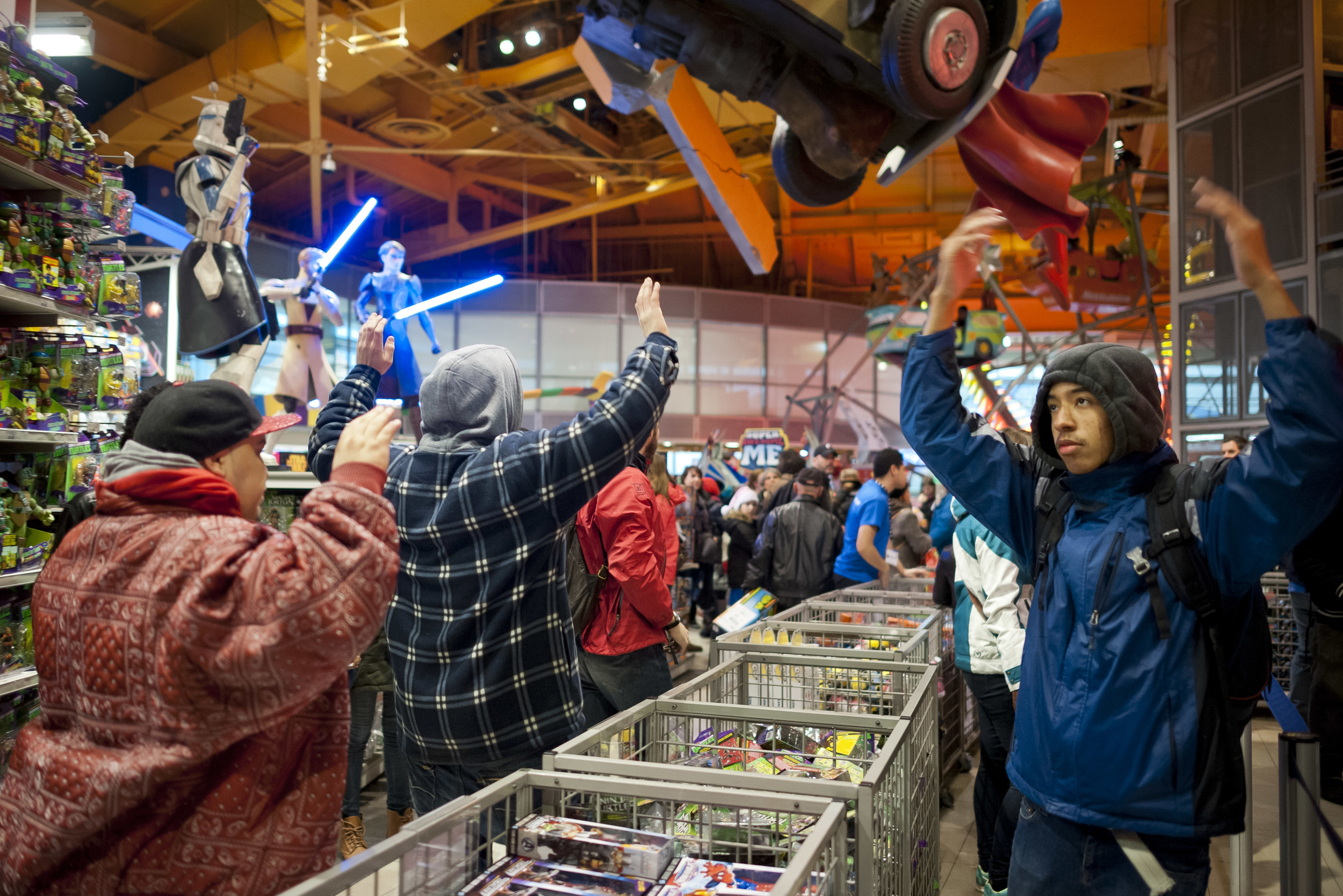  Protestors march through the Times Square Toys 'R Us. 