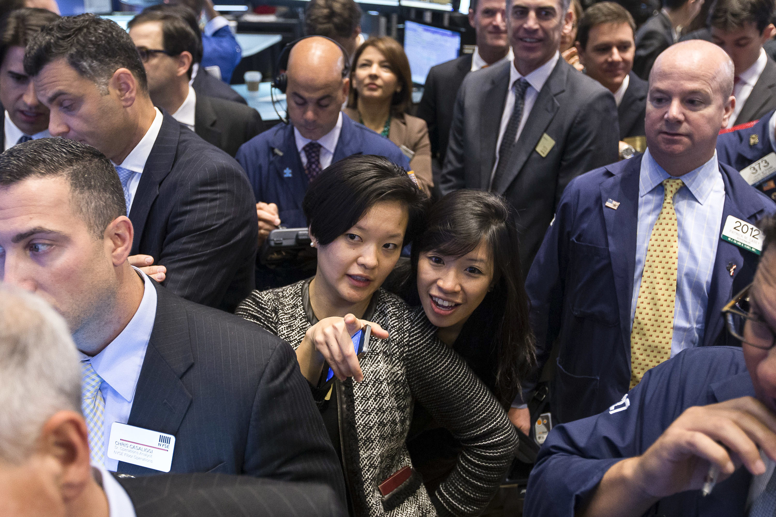 Watching the price as their company's stock opens for the first time. 