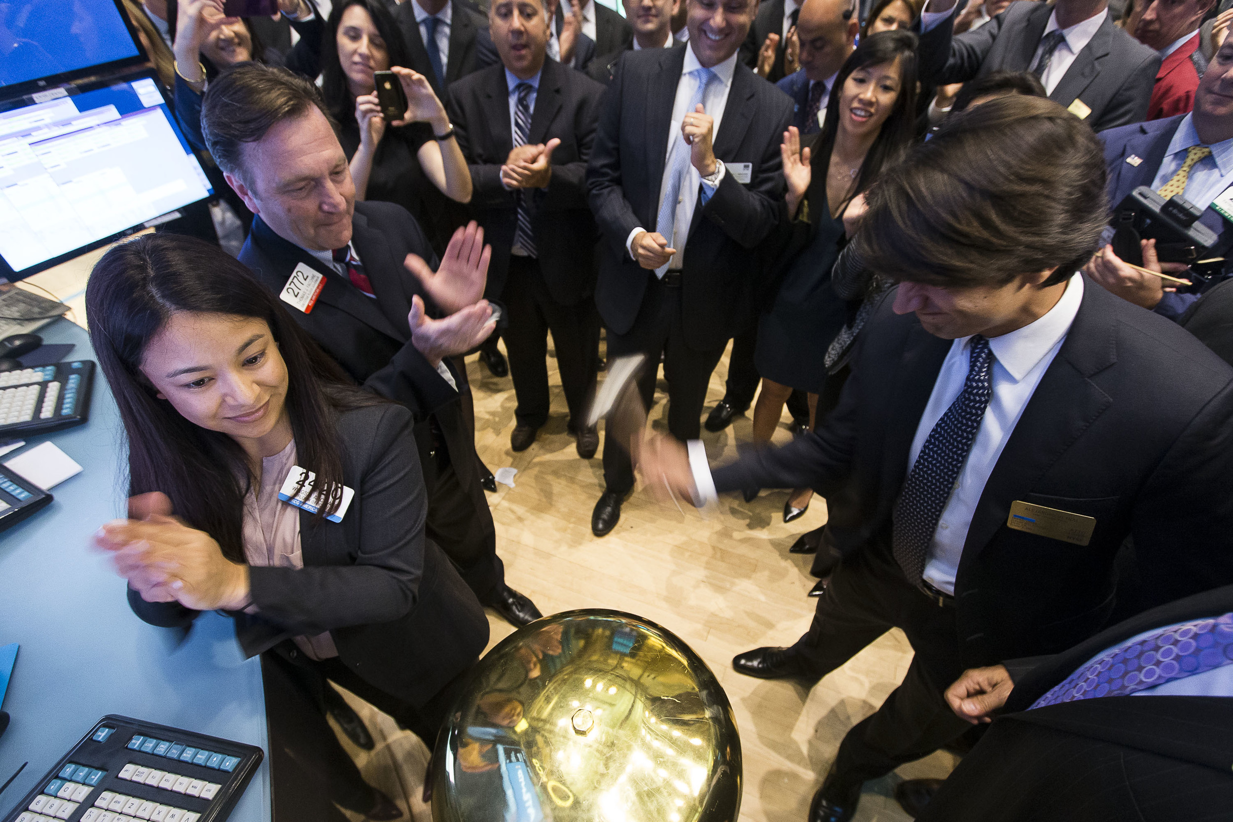 A CEO forcefully rings the first trade bell, signifying the official opening of his company's stock.&nbsp; 
