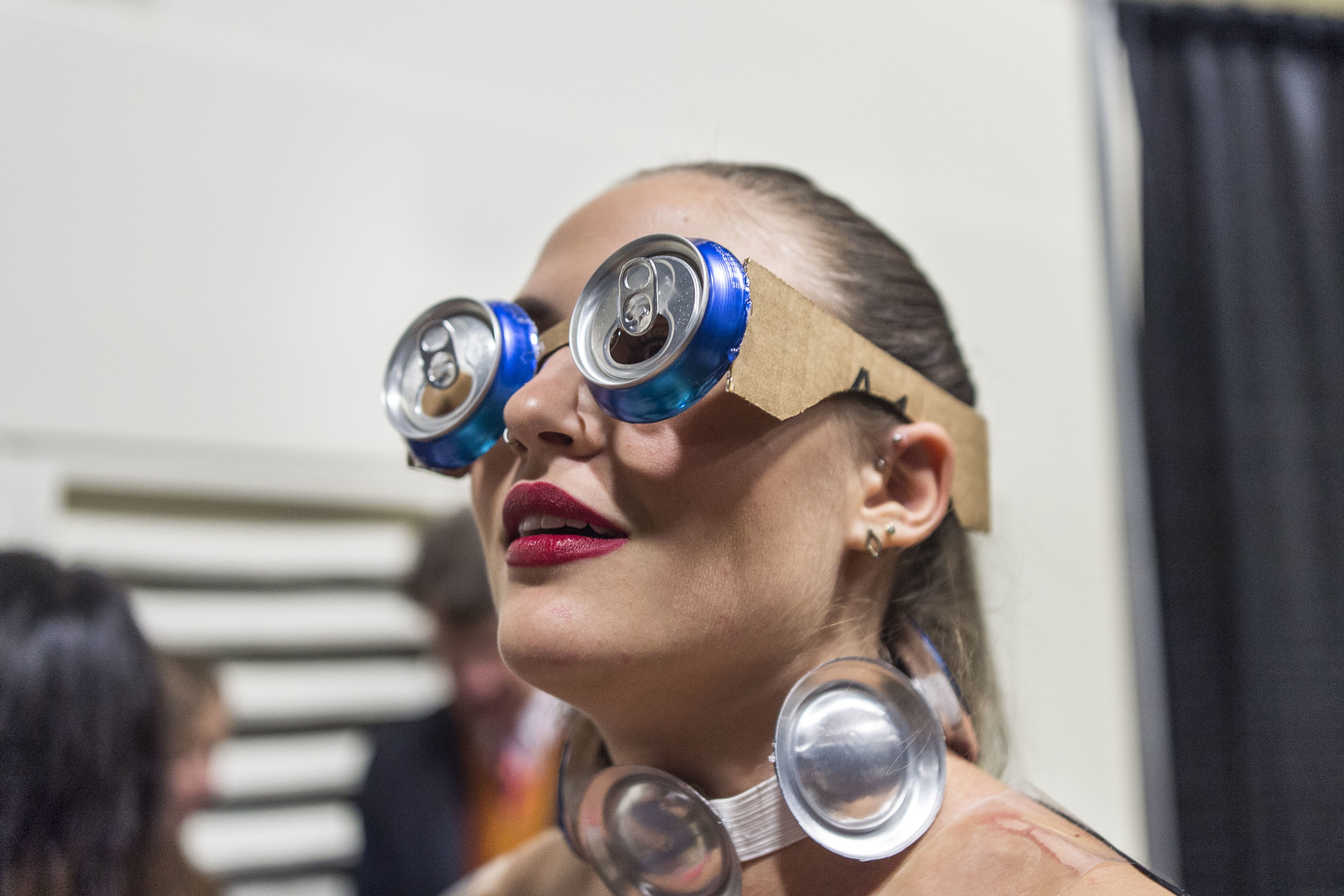 Elise Krims '16 of Concord, Mass., models "Phoenix Rising from the Trashes," designed by Kevin Tejada '17 of Mount Kisco, N.Y. The design features magazines, aluminum cans, cassette tape and cardboard. Tejada noted "If Barbarella and Madonna had a child, this would be her."