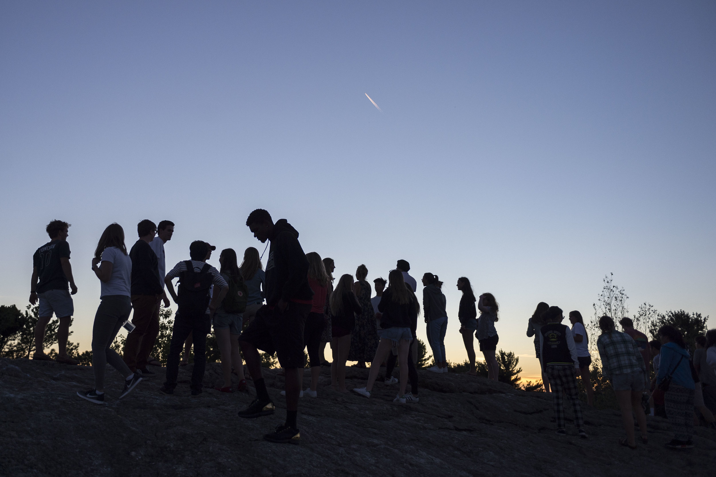  First year students scale Mount David to view the sunset as they enter the first night of their Bates experience on August 29th 2016.    