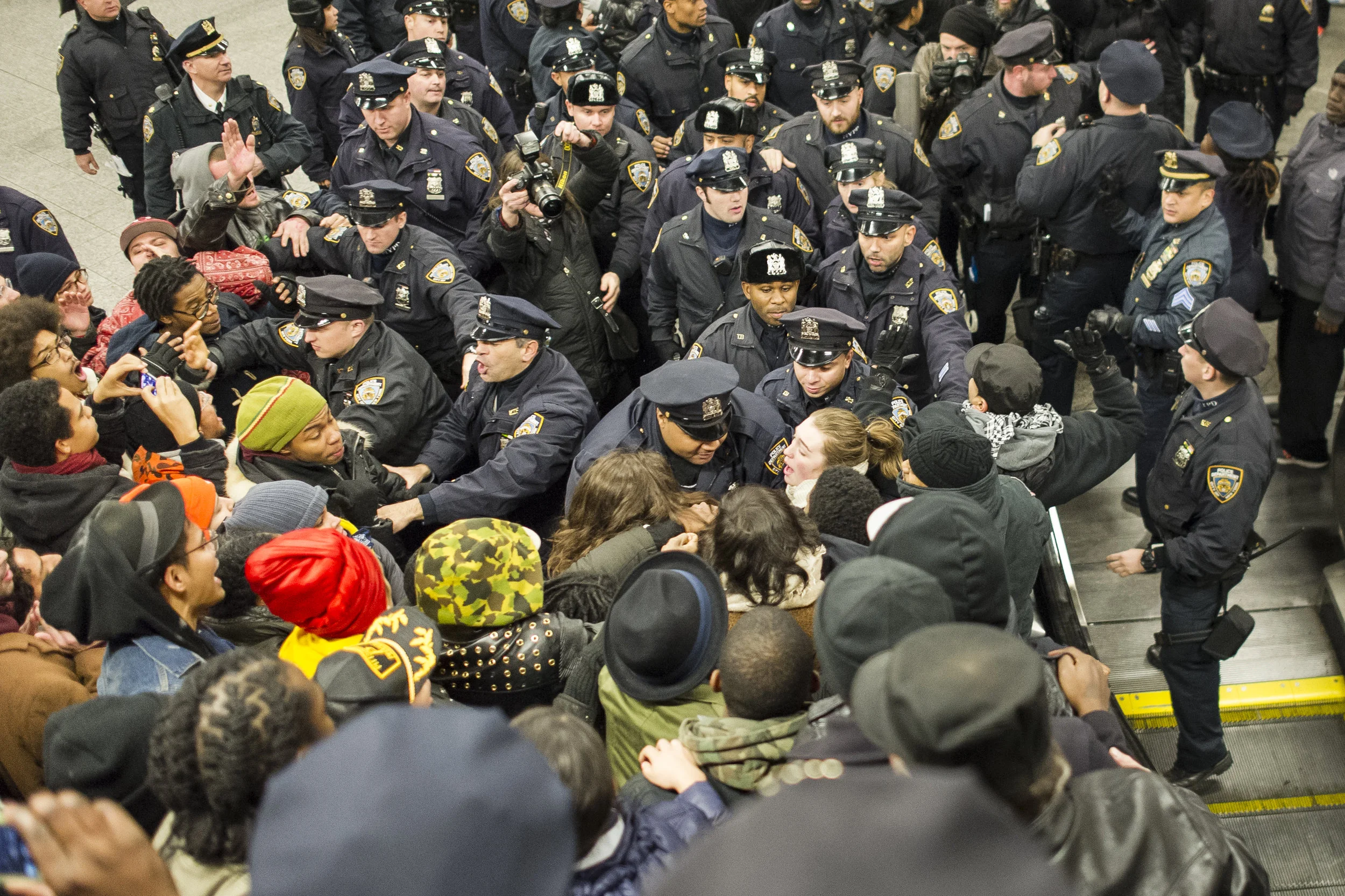 Tensions finally snap between police and protestors at the Barclays Center subway station on December 8th, 2014. Weeks of protest followed a Staten Island grand jury's decision on December 3rd 2014 not to indict Officer Daniel Pantaleo in the killing of Eric Garner.