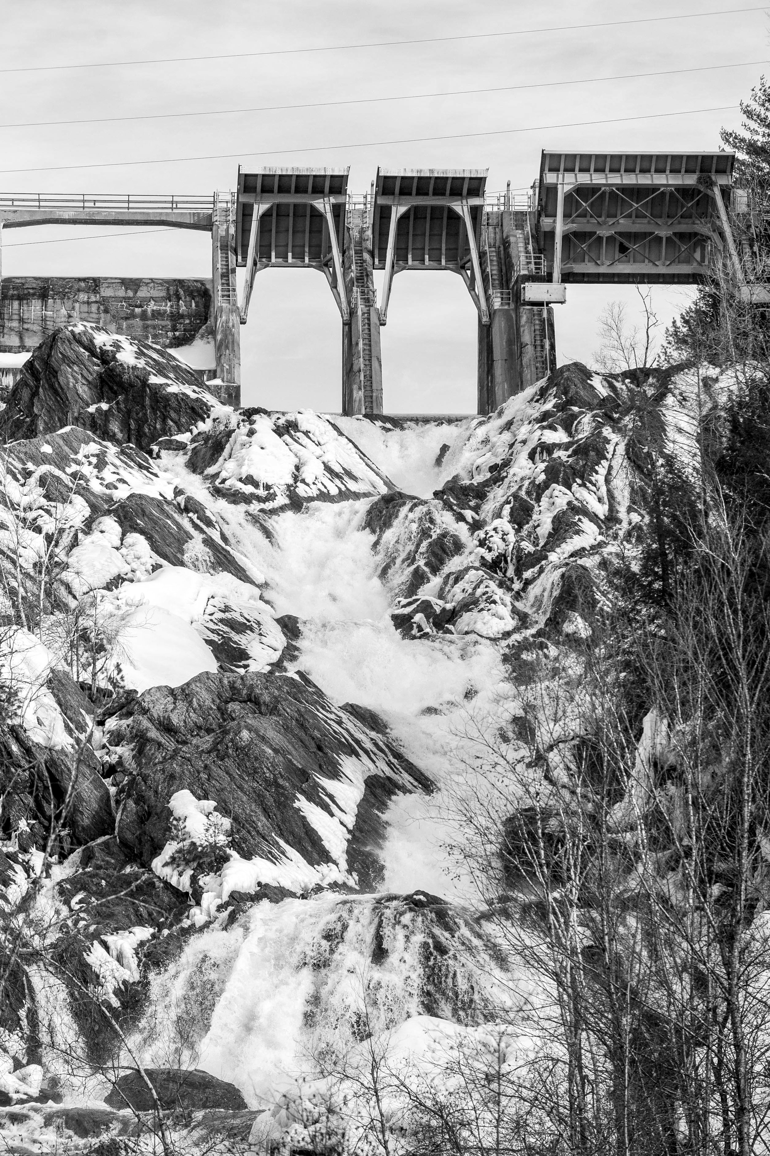 The Winooski River flows through the Waterbury Dam in Little River State Park on Sunday, January 28th, 2018.