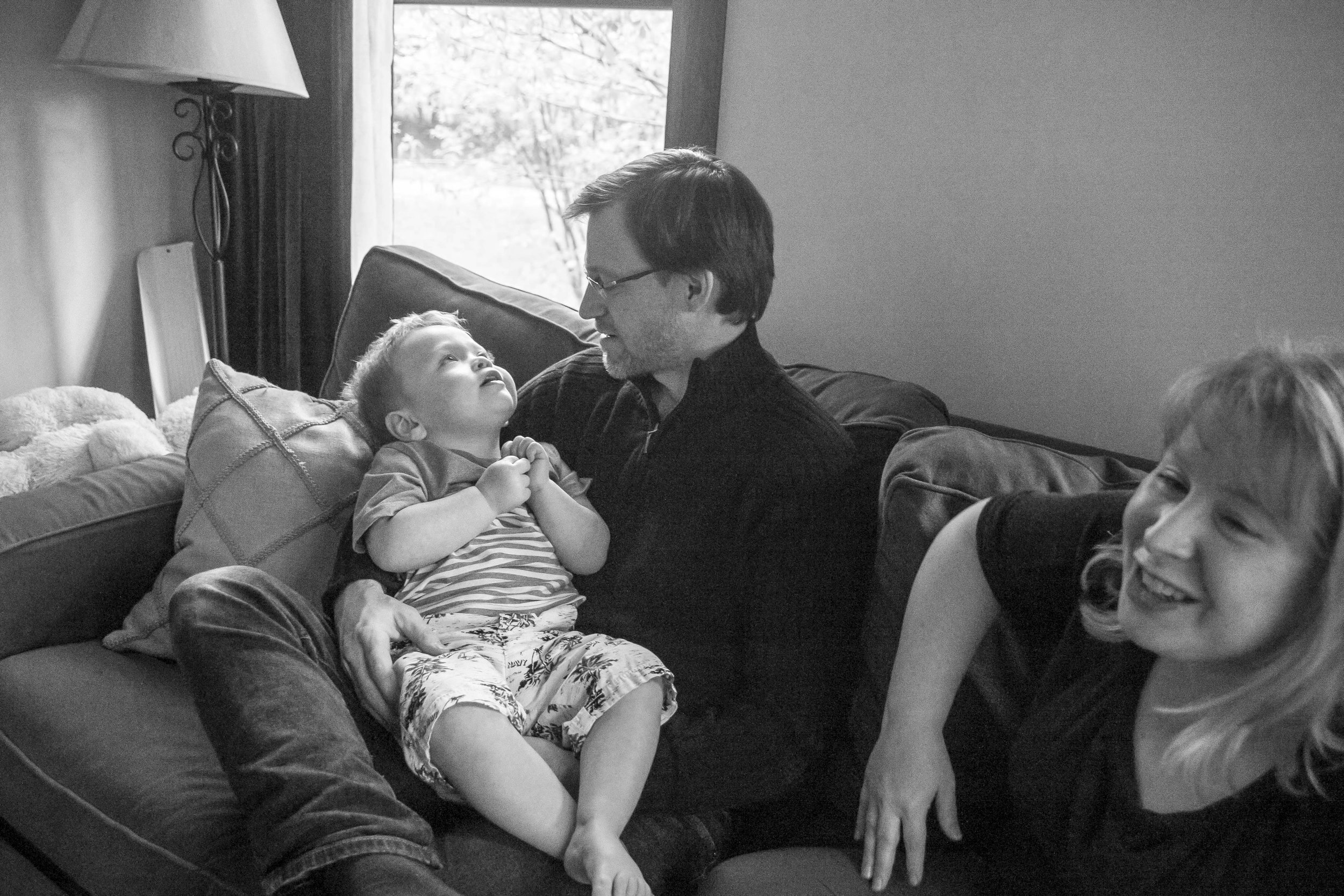 Rowan Smith is held by his father Jeremy at their East Montpelier home on May 15th, 2018. The Smith family is suing the city of Montpelier over emergency ambulance coverage necessary to respond quickly to Rowan's needs, who suffers from chronic seizures and breathing problems.