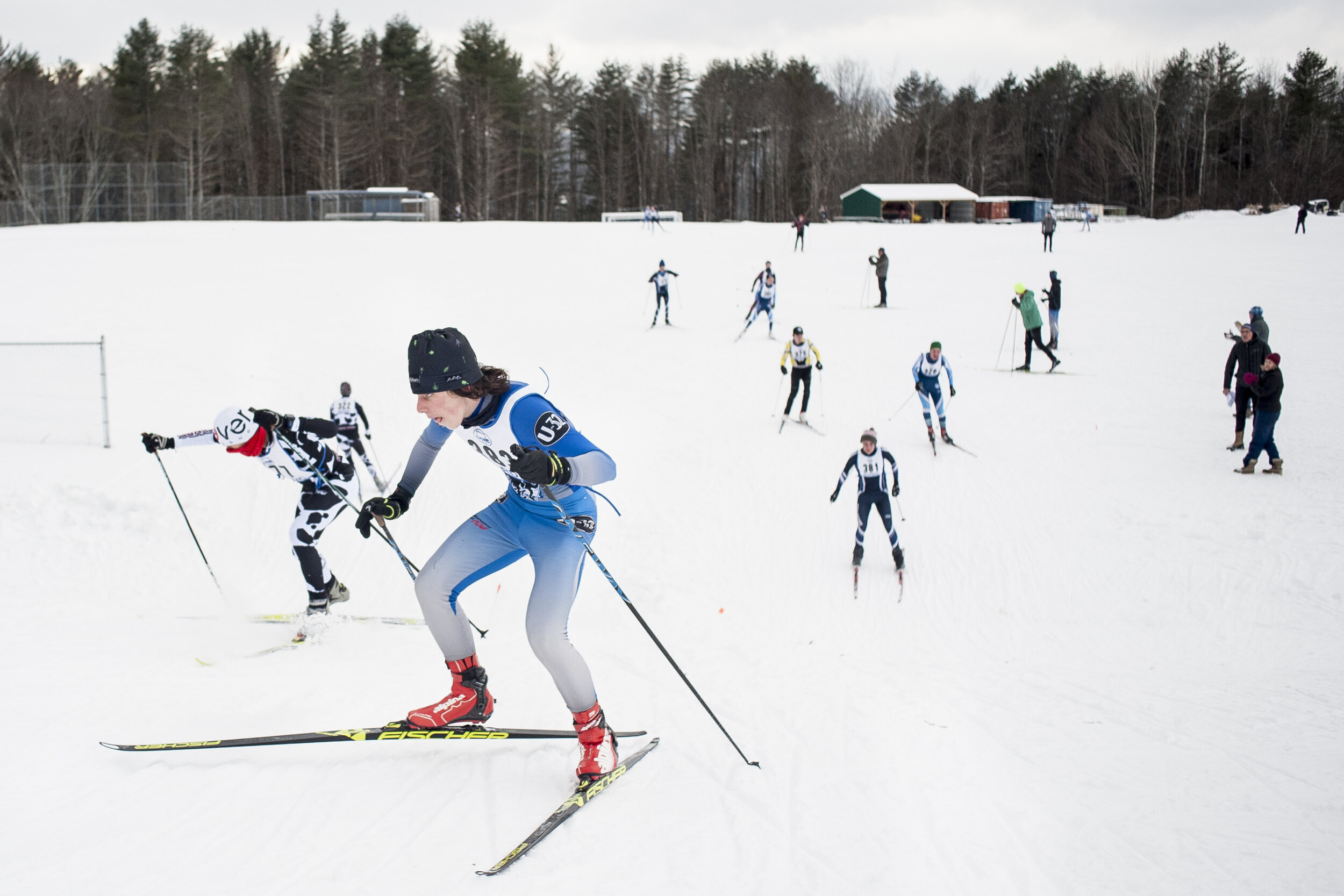  Varisty skiers scale an uphill section of the course on Tuesday, January 16th 2018 at U-32 Middle &amp; High School in Montpelier, VT.     