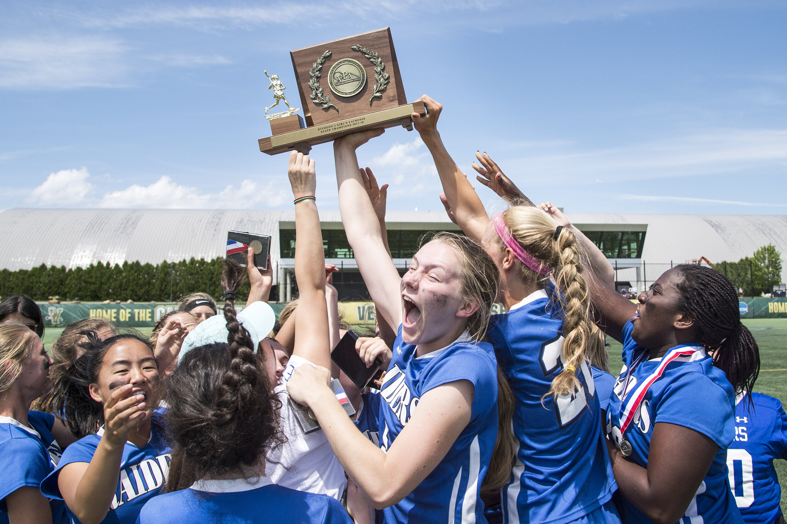  The U-32 girls’ lacrosse team celebrates their Division Two Championship victory over GMVS on Saturday, June 9th 2018 at the University of Vermont in Burlington, VT.   