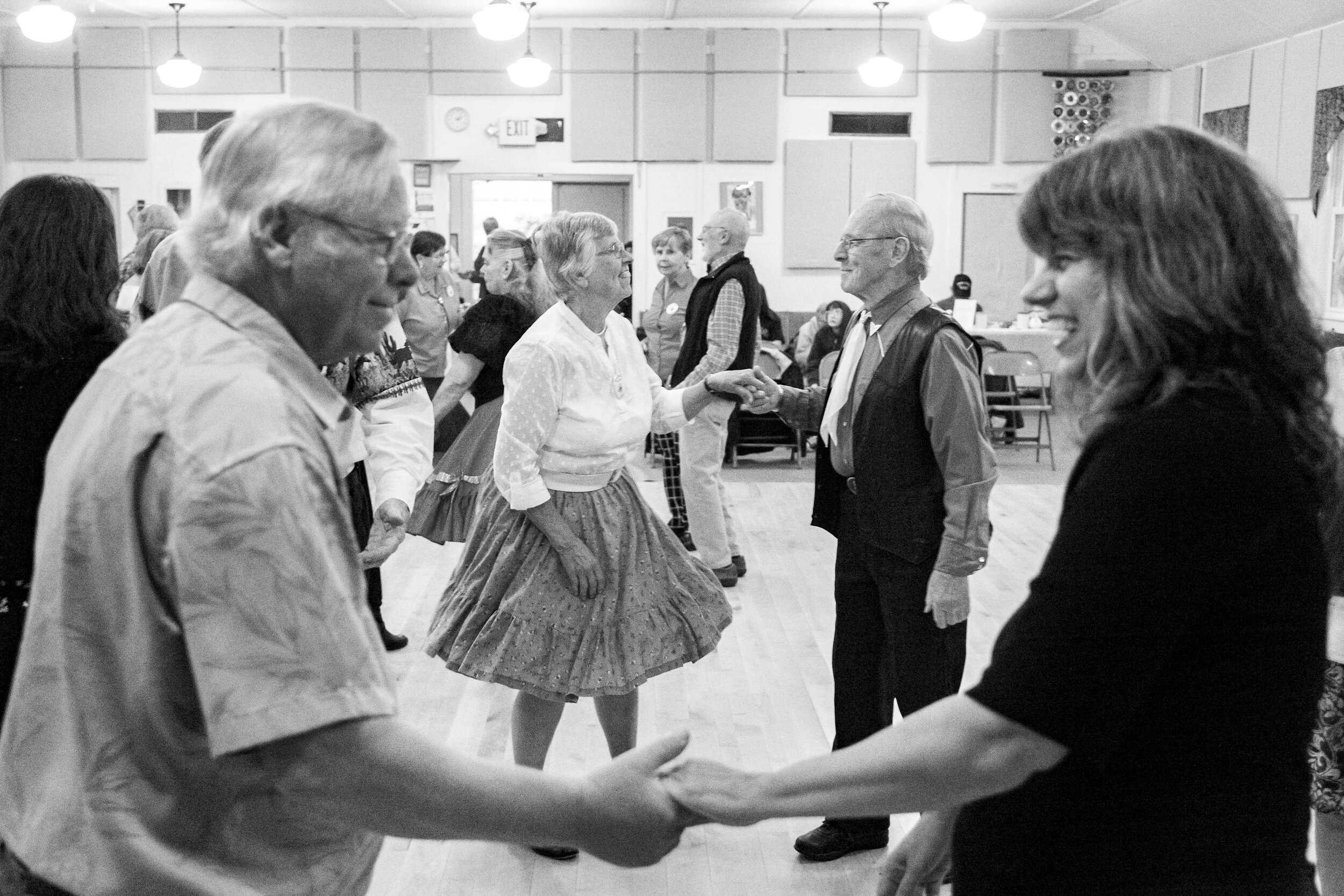  Arnie Williams, center-right, and Denise Hark, center-left, join their fellow dancers in bowing to their partners at the conclusion of a song on Sunday, October 6th 2019 at the first gathering of the Barre Area Squares at Capital City Grange in Berl