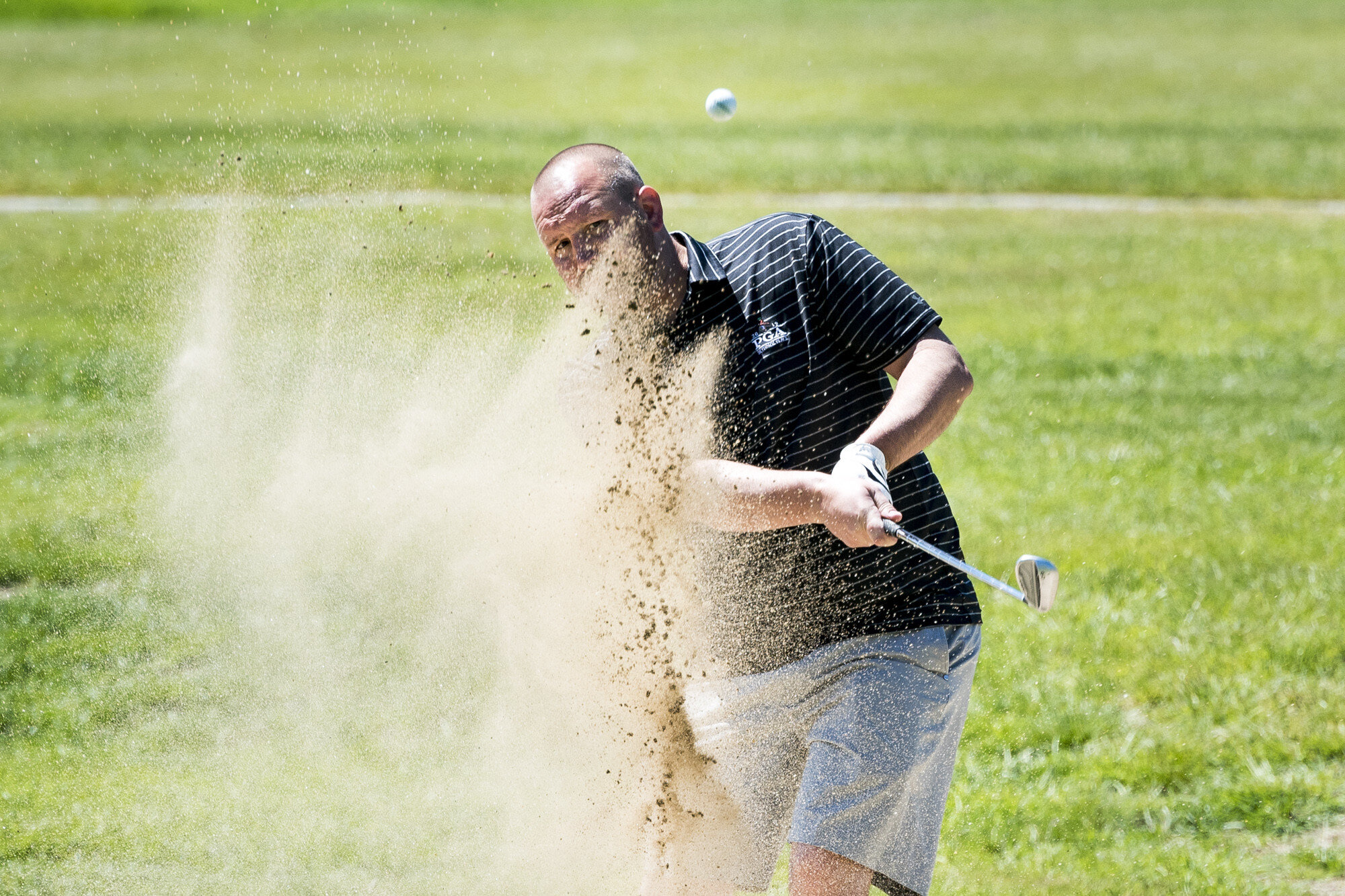  Paul LaRoche blasts out of a bunker at the Montpelier Elks Country Club on Sunday, June 9th 2019. 