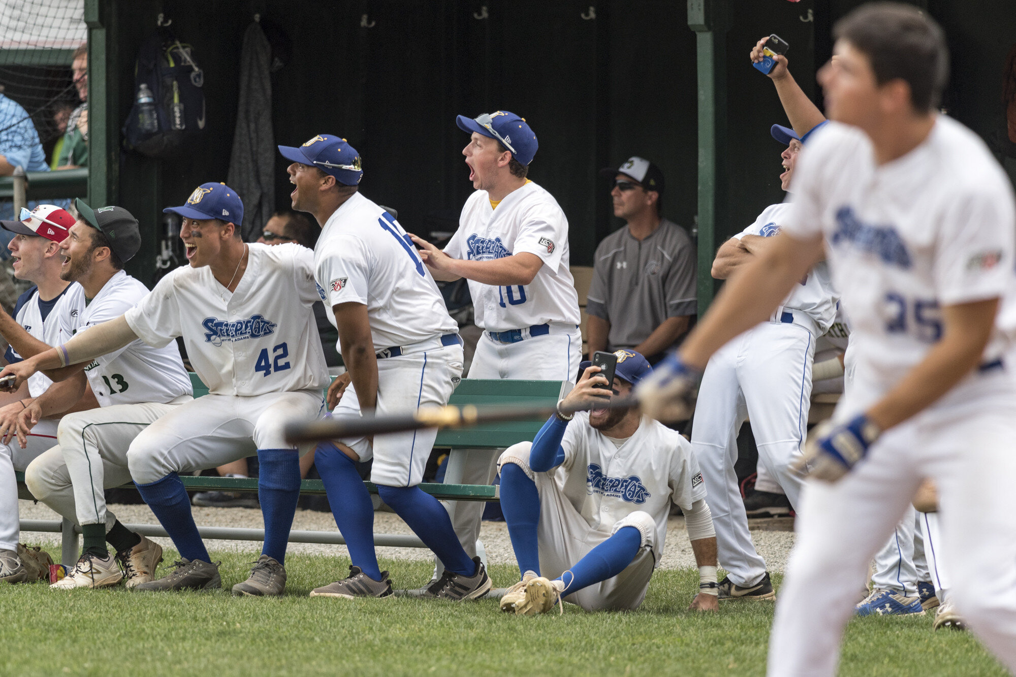  North Adams SteepleCats All-Stars react as their teammate Matthew Koperniak, right, goes on a hot streak during the 2019 NECBL Home Run Derby in Montpelier, VT on Sunday, July 28th 2019.  