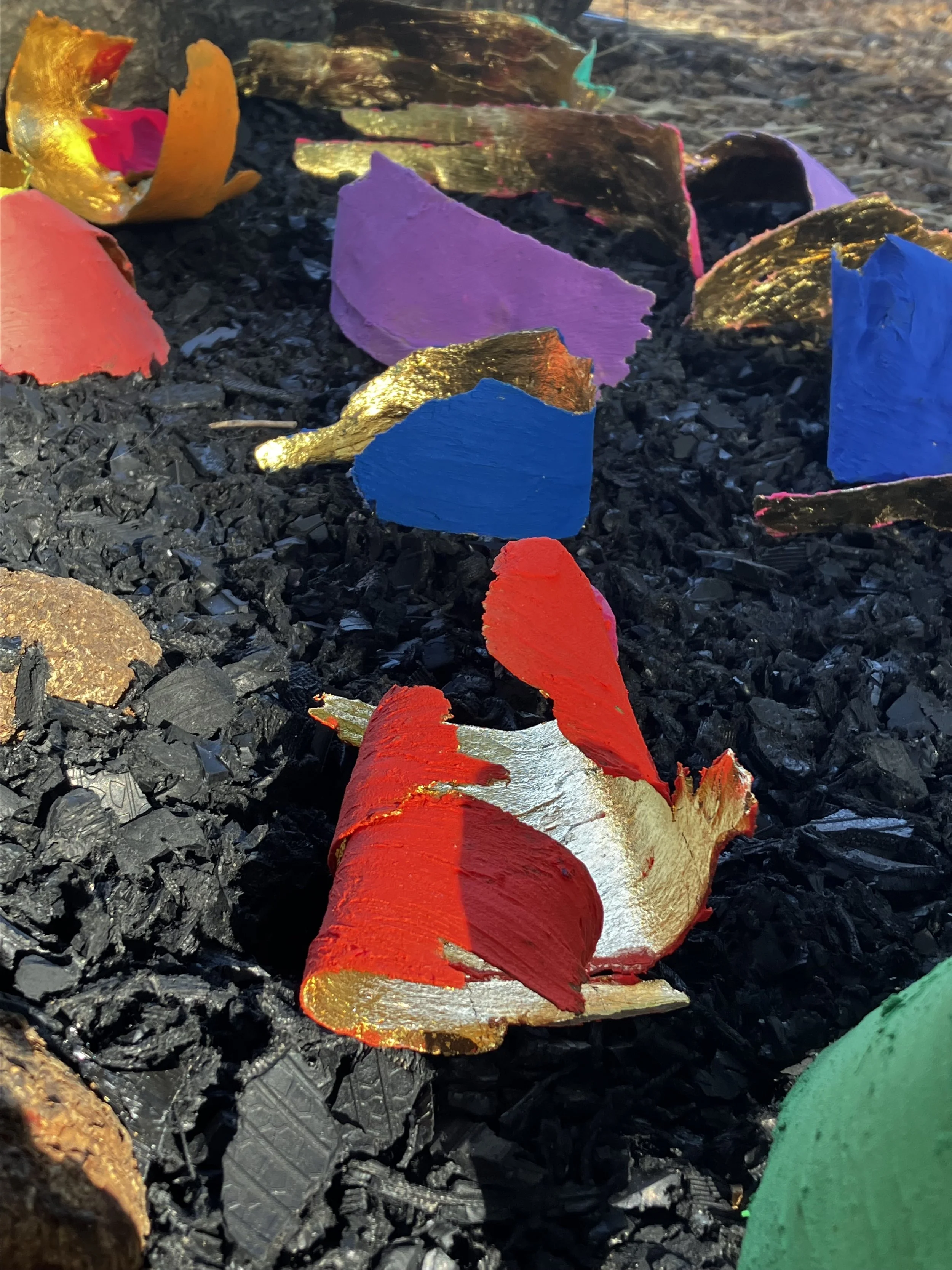 Shed, 2020-present Acrylic, modeling paste and gold leaf on found bark and rubber mulch, Dimensions variable