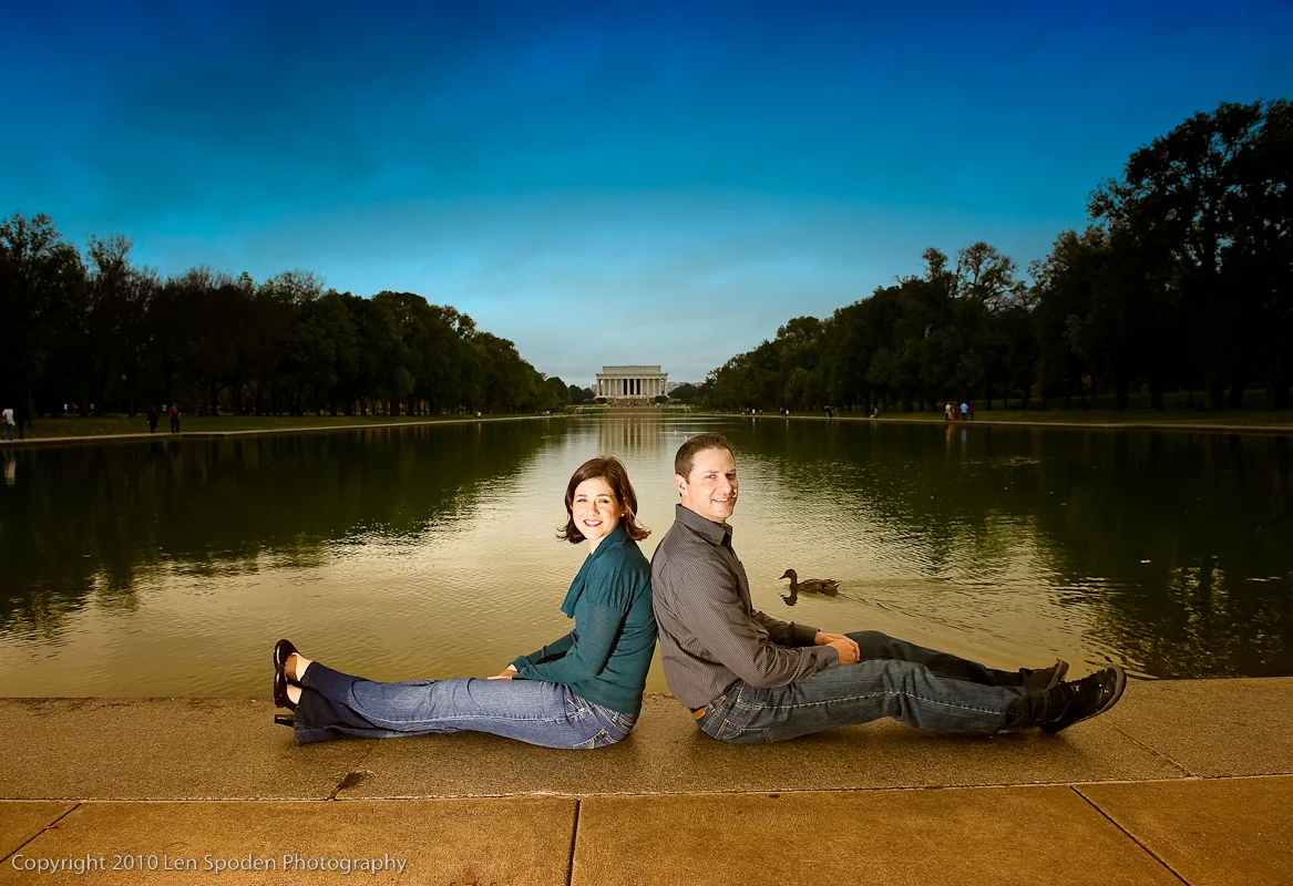Engagement photograph in front of the Lincoln Memorial reflecting pool
