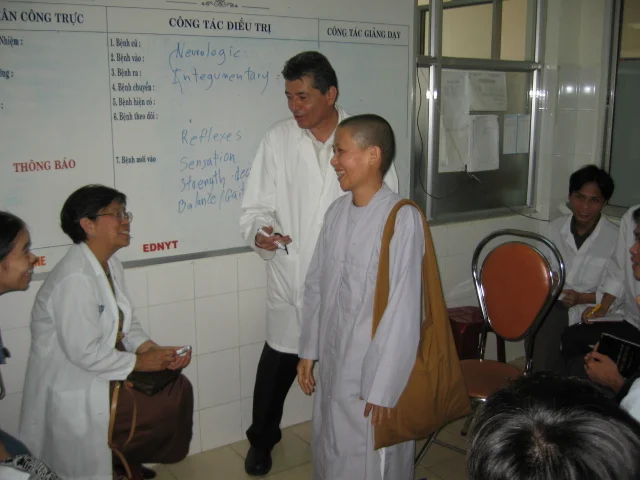 Dr. Libby and Dr. Randy teaching at the local university.