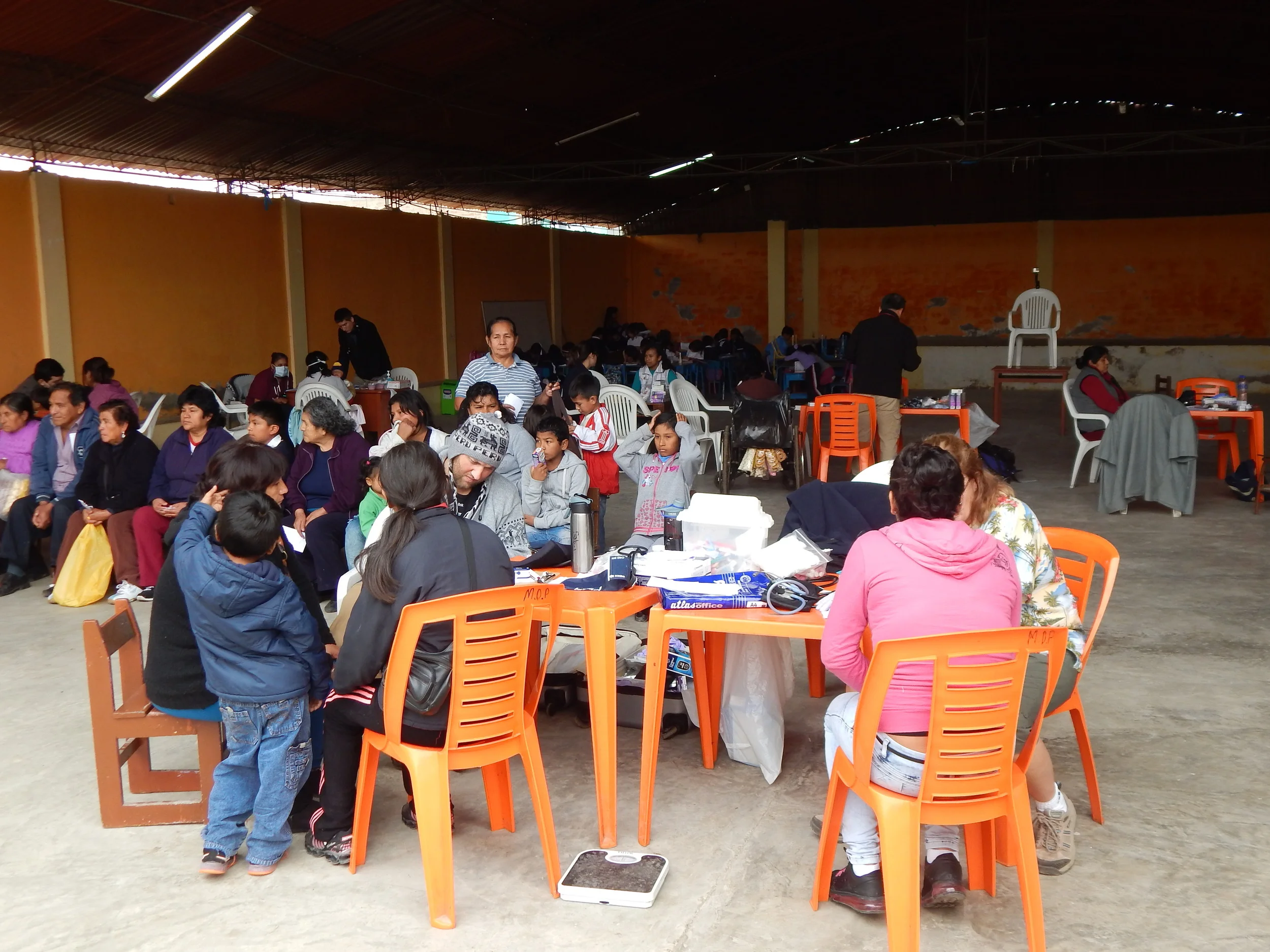 Our last day, we shared space with school children attending class in the back of the large, open aired, covered court