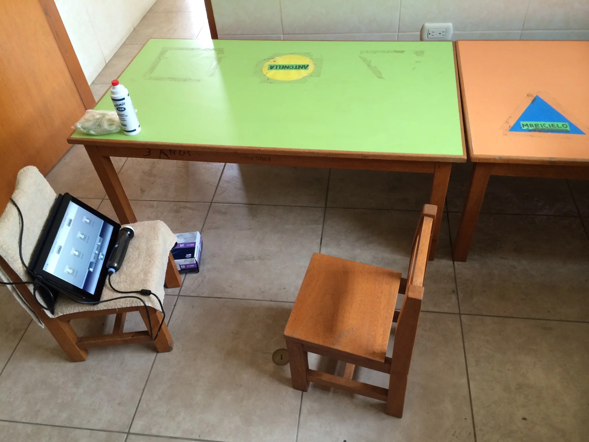Some ultrasound tables are a little harder than others! Here, small school tables and chairs suffice.