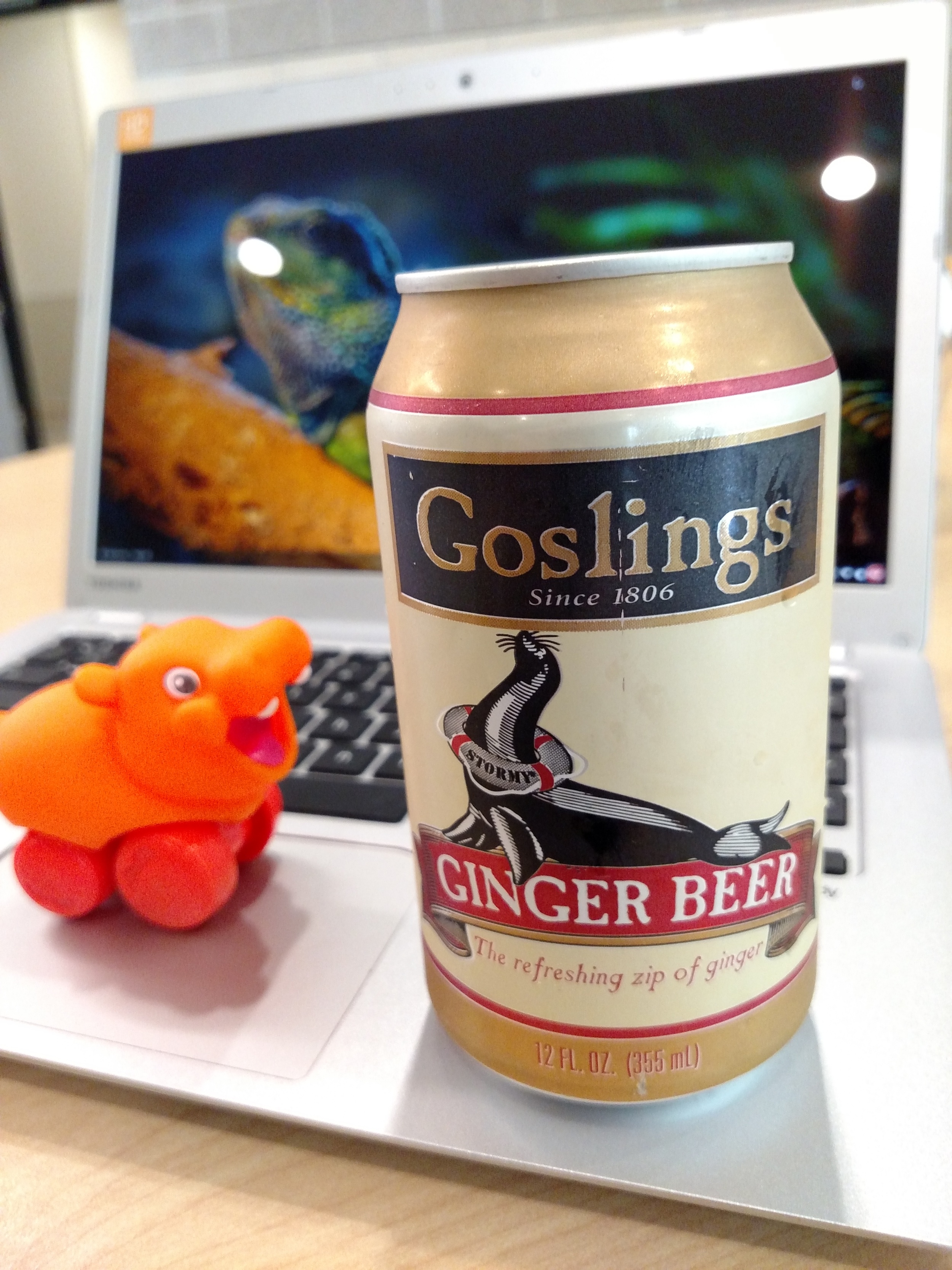 A seal, a hippo, and an iguana review a soda...