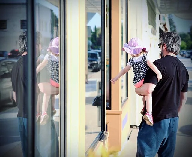 #windowshopping #traversecity #shoptillyoudrop #toddlers #reflection #photography #northernblissphotography