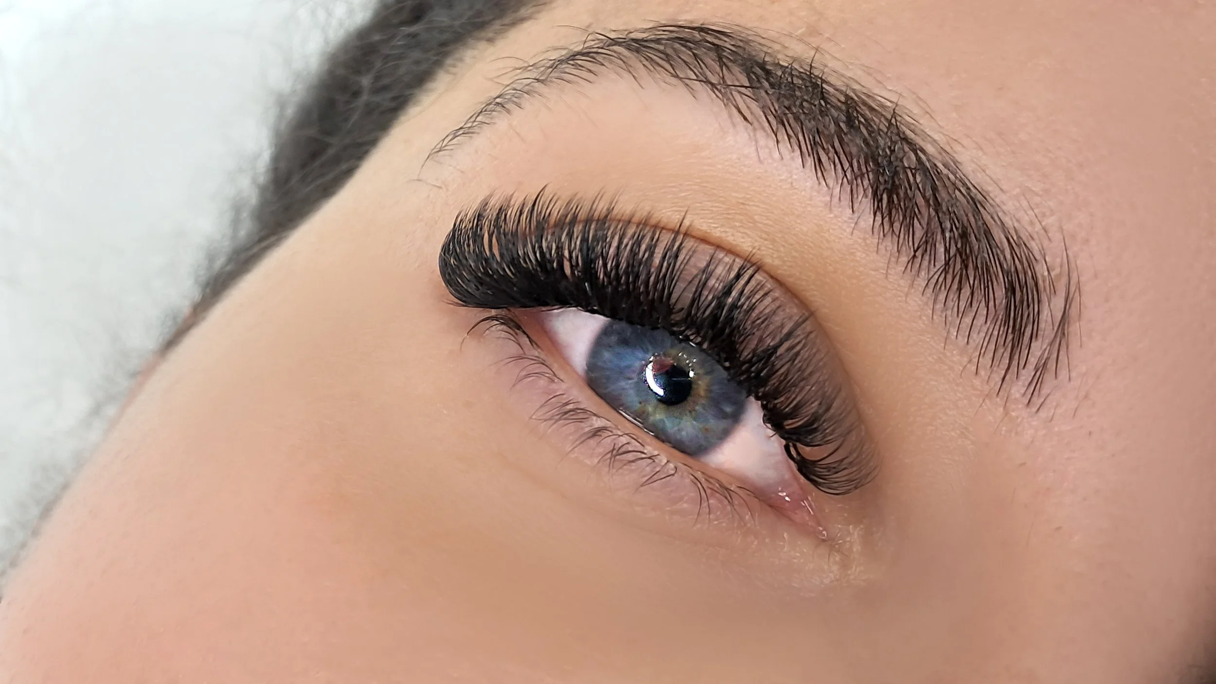 Mega volume lash extensions creating dramatic full, dense lashes in Berkeley California at Polish & Glo