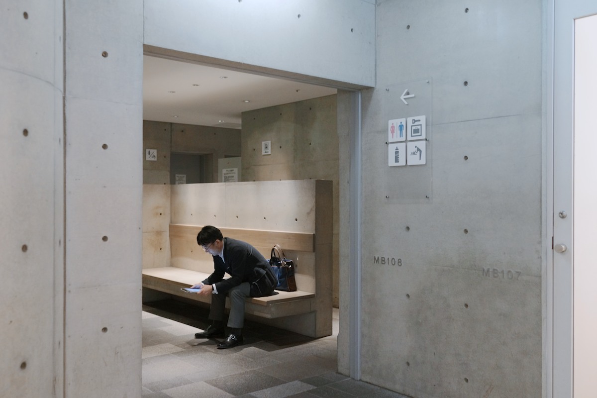 Waiting by the restrooms at Omotesando Hills.