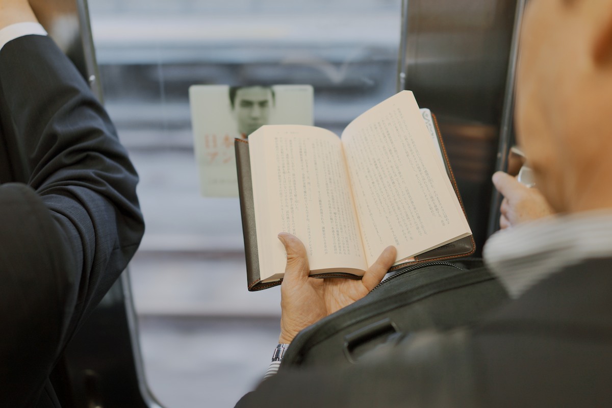 I've never seen so many commuters reading books. There are more passengers with phones/tablets but a good 30% read actual paper books.