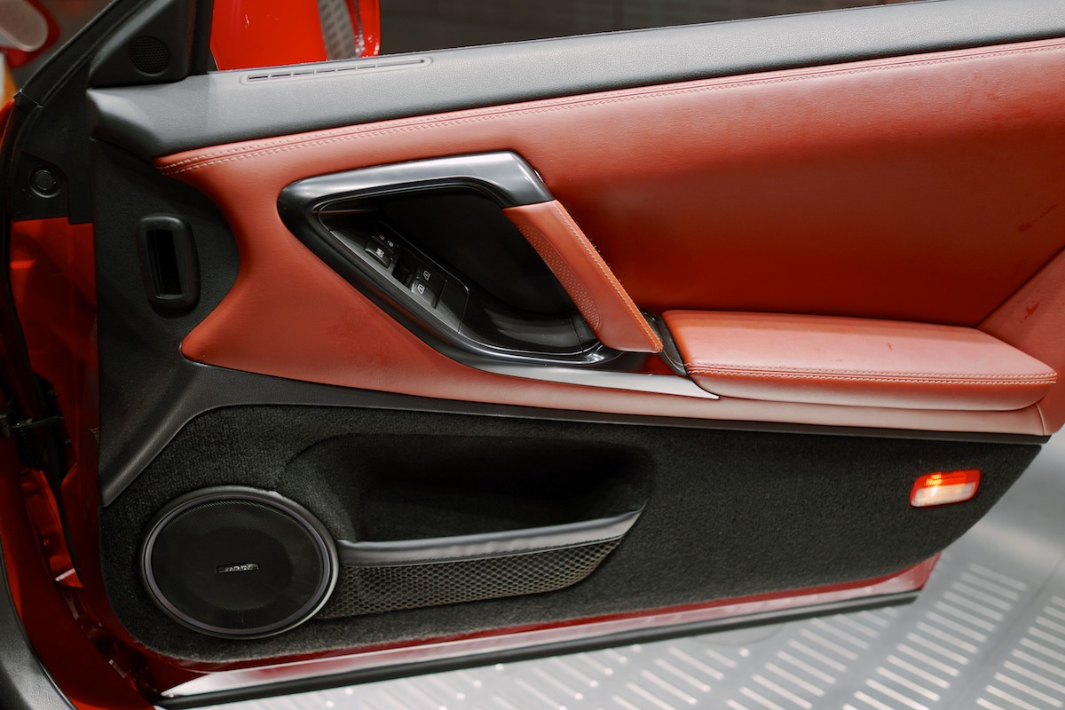I don't know why we've stopped using carpeted doors - much better than scuffed plastic panels. 