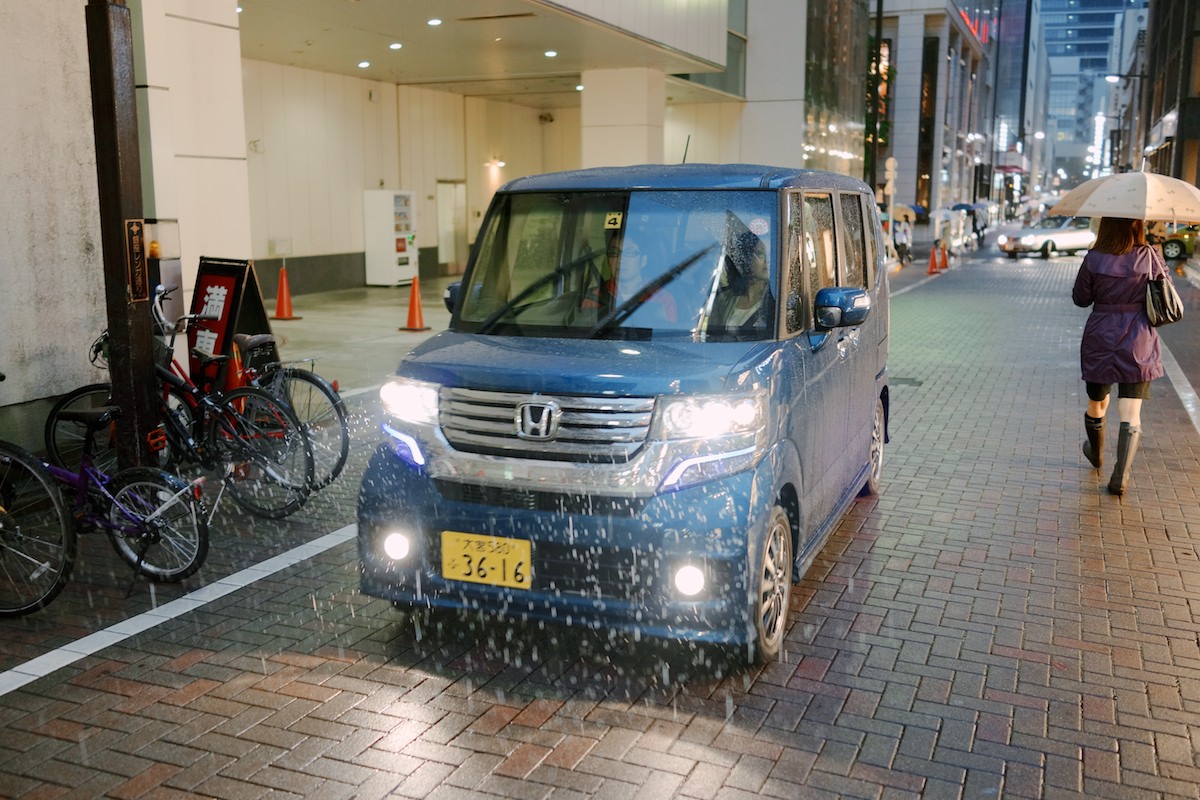 Notice how kei cars have differentiated yellow license plates. Honda N BOX Custom shown.