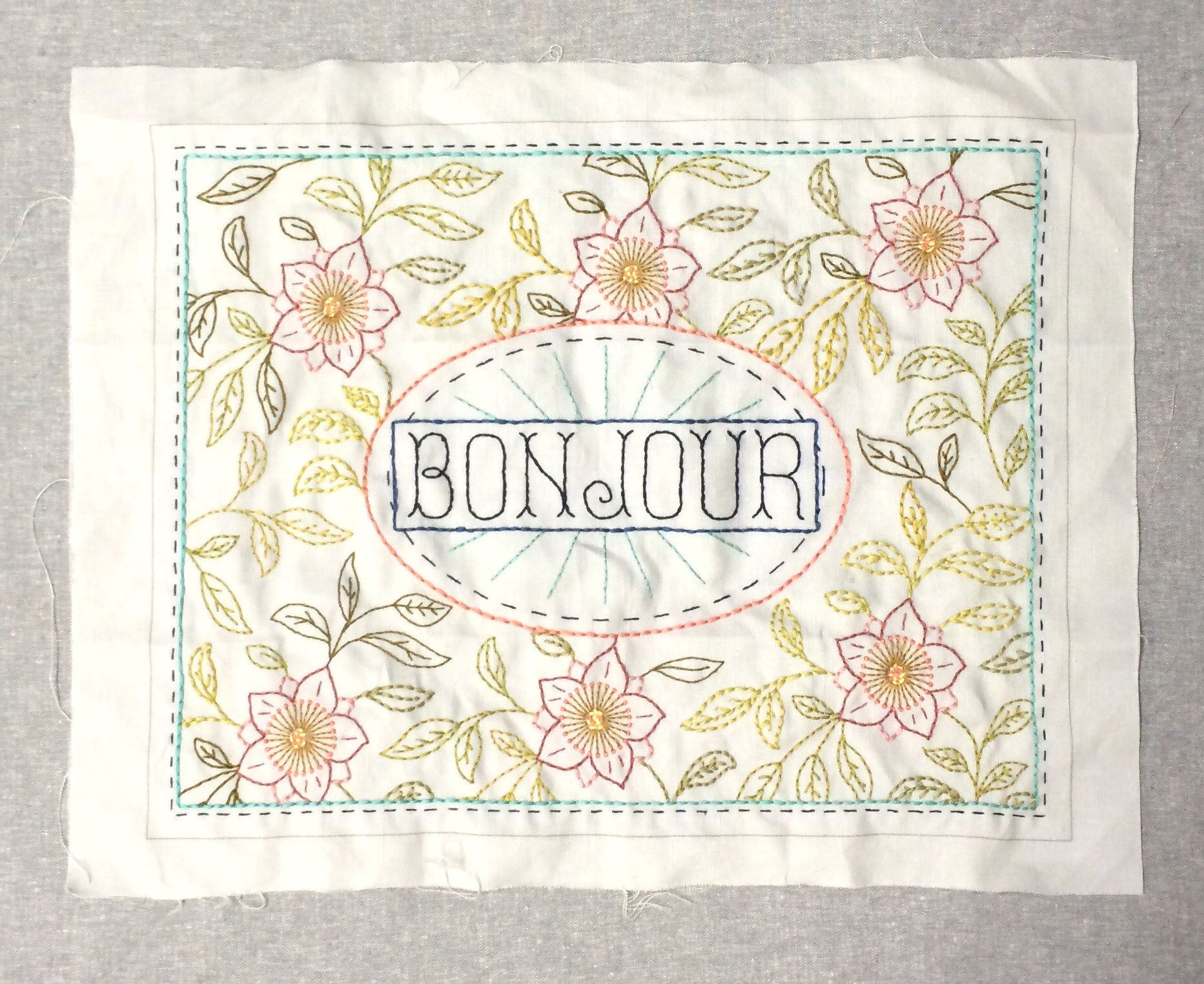 My 'Bonjour' sampler waiting to be made into a cushion.