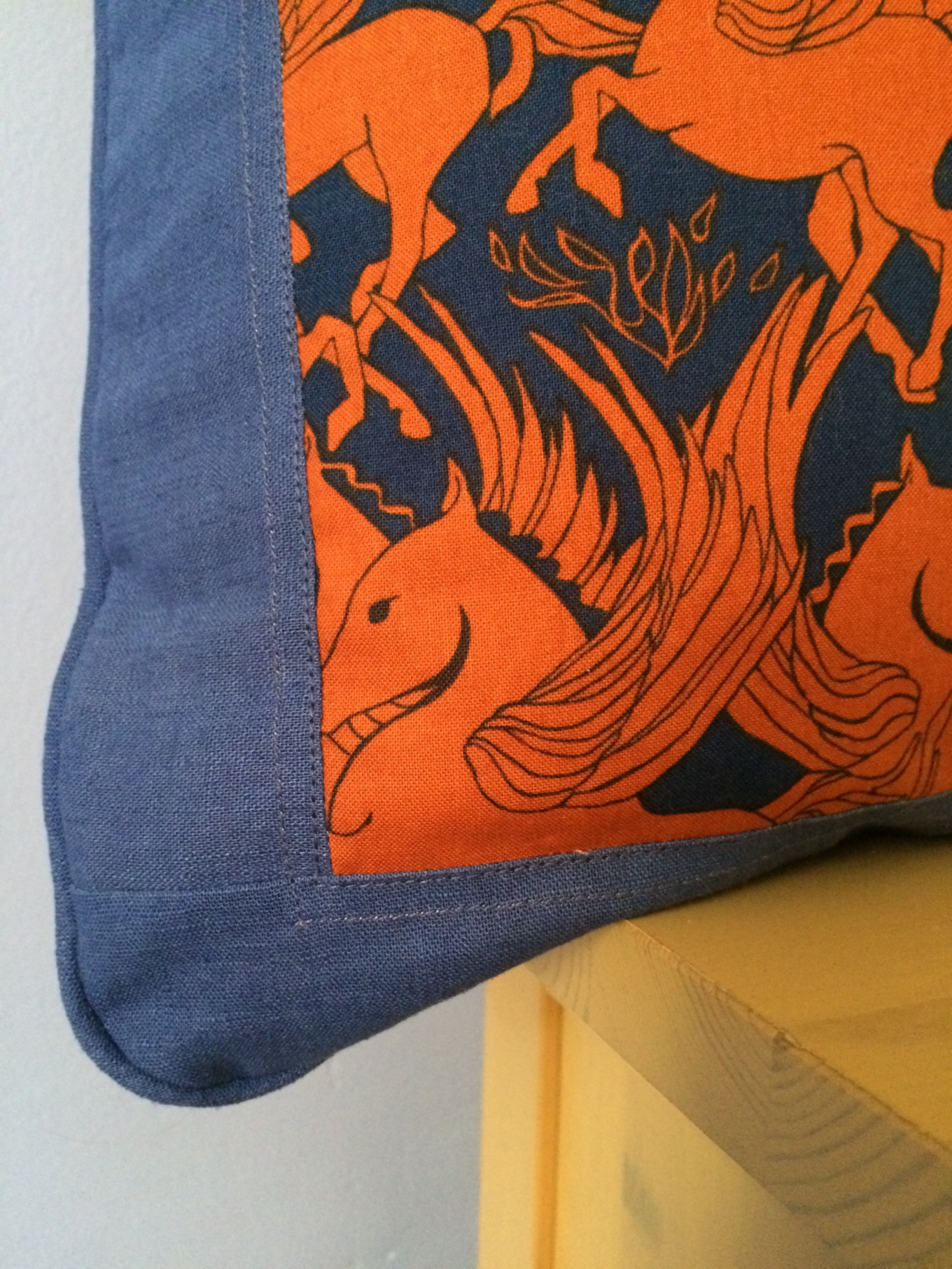 A piped edge for definition, and a double row of stitching for embellishment.