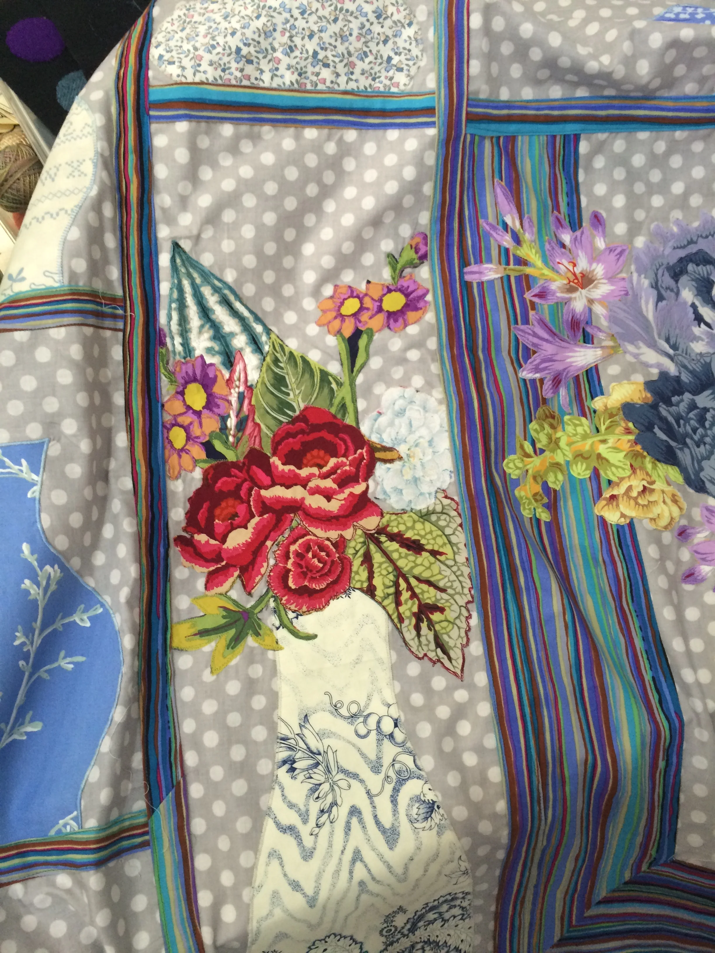 Marg's blue vases are filled with beautiful flowers.