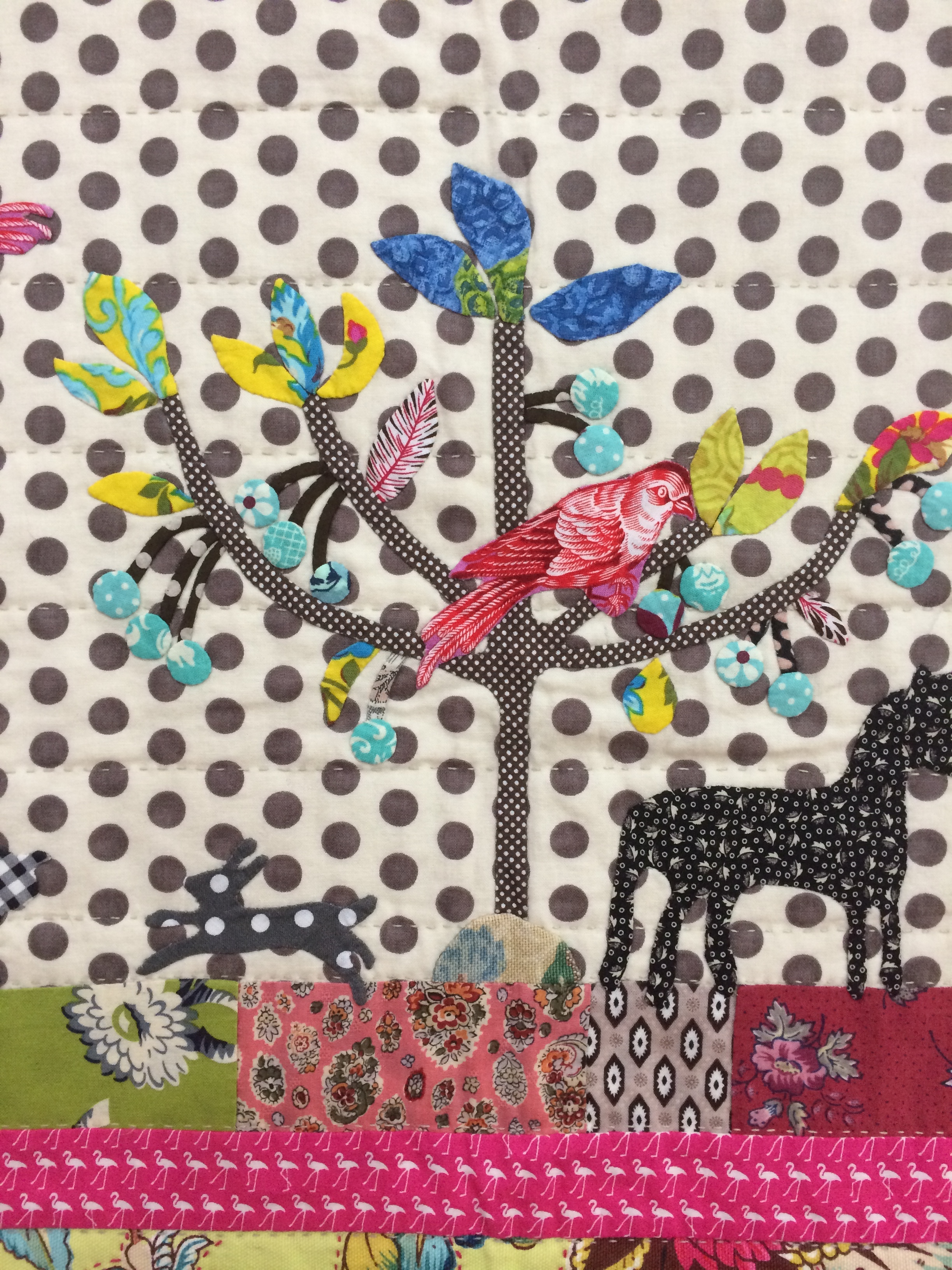 I love the leggy flamingoes and contrast in spots. This is one of Marg's quilts.