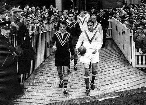  Willie and Clive Churchill lead the teams out for the first 1952 test match at Headingley.