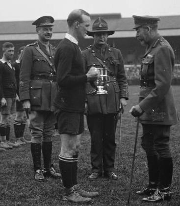 New Zealand captain James Ryan receiving the King’s Cup from George V