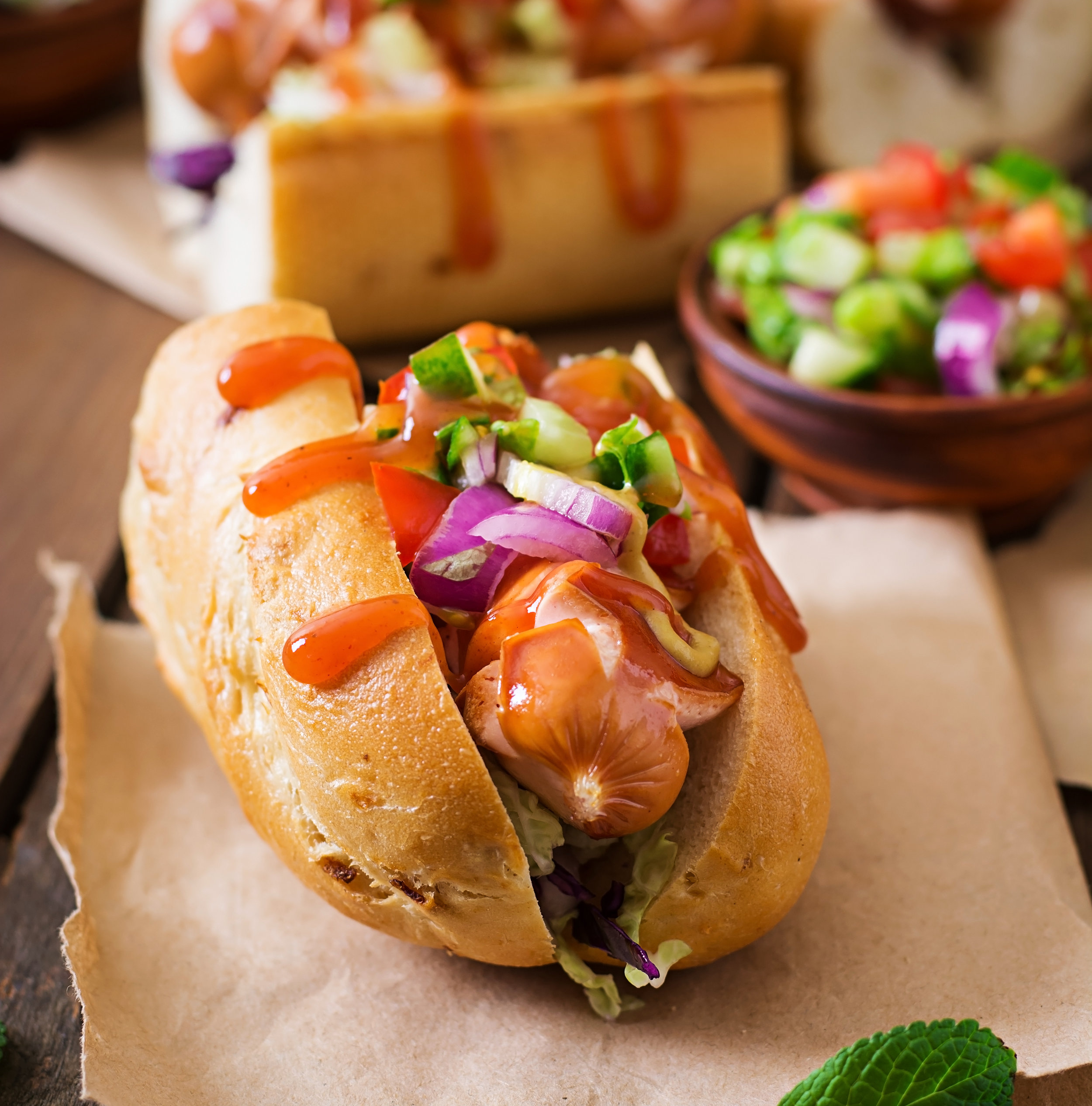hot-dog-sandwich-with-mexican-salsa-on-wooden-PF8HYBF 2.jpg