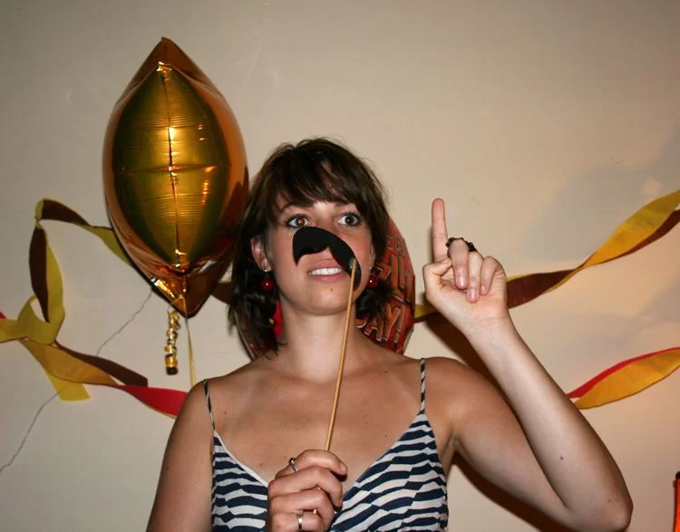 Ms. Smith delivering a speech at the annual Burger Prom Forum in 2011. Photo Courtesy of Regan Smith.